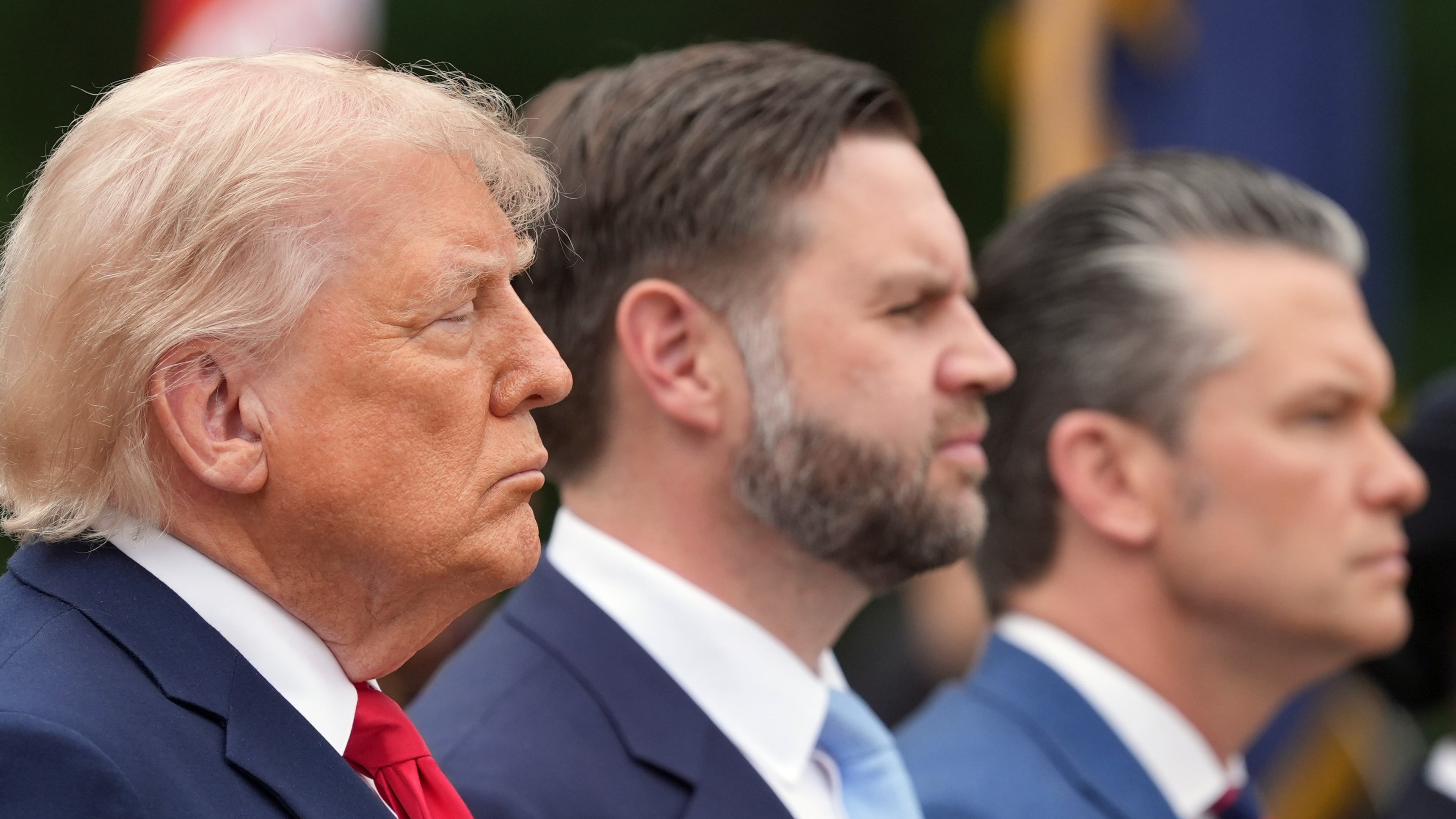 President Donald Trump, from left, Vice President JD Vance and Defense Secretary Pete Hegseth attend a ceremony at the Tomb of the Unknown Soldier in Arlington National Cemetery on Memorial Day, Monday, May 25, 2026, in Arlington, Va. (AP Photo/Alex Brandon)