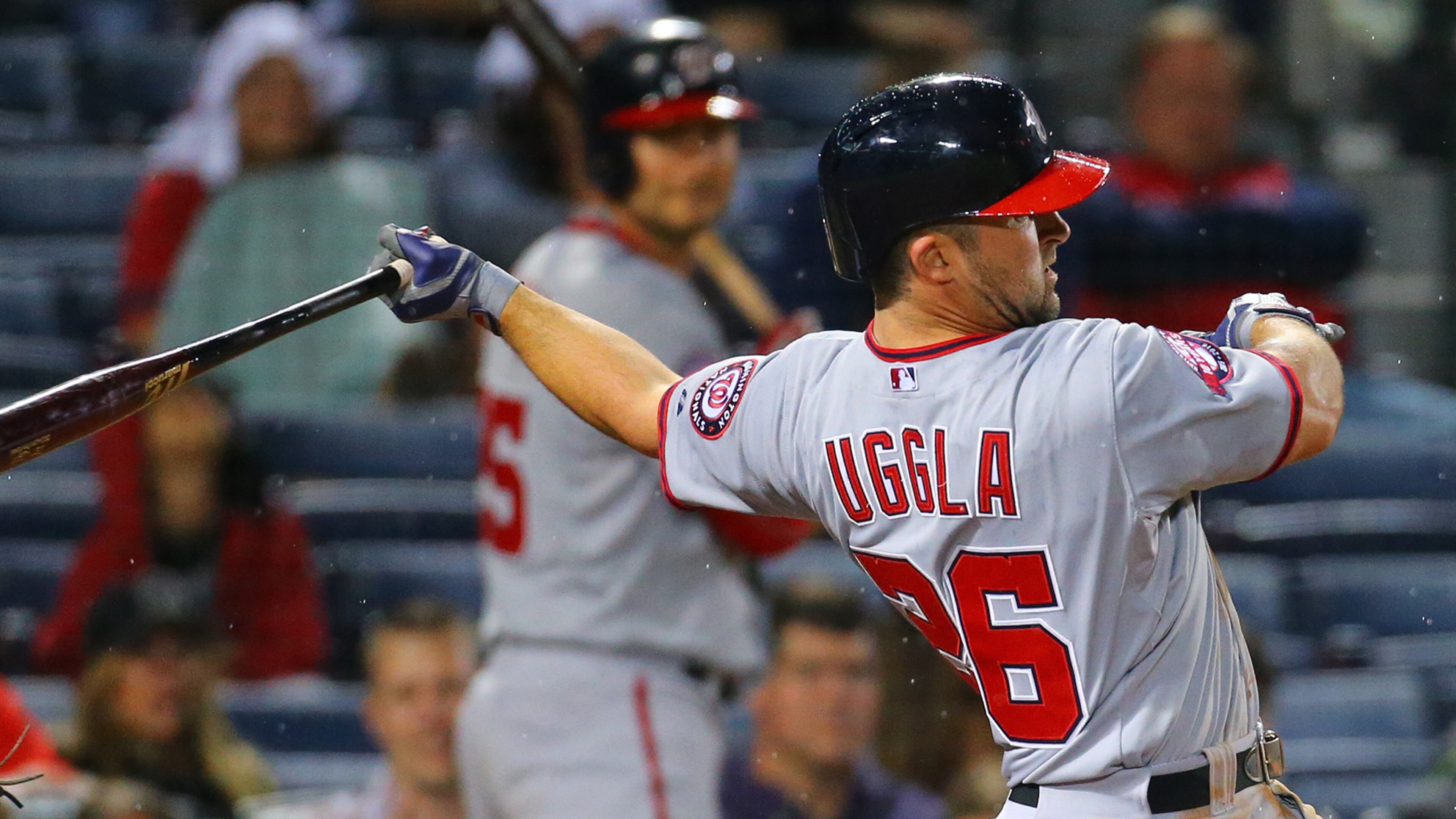 Nationals Dan Uggla hits a three run homer in the 9th inning to take a 13-12 lead over the Braves in a baseball game on Tuesday, April 28, 2015, in Atlanta.