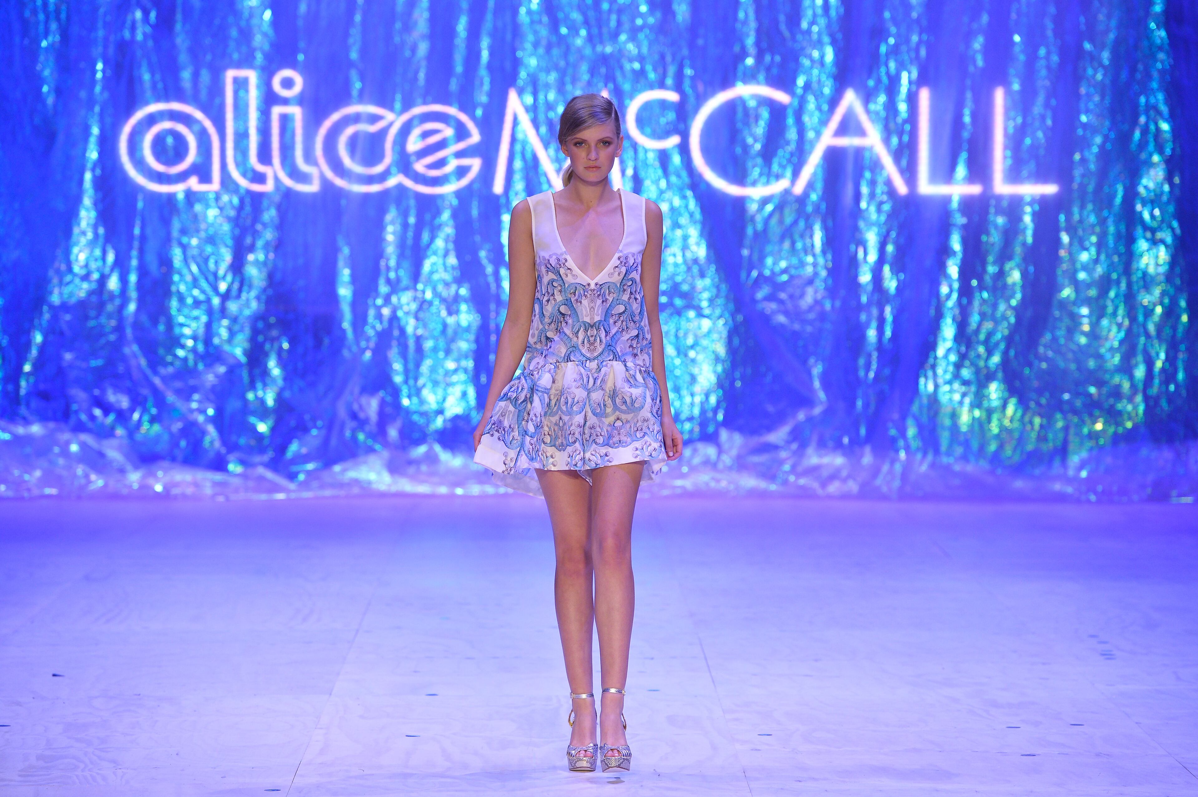 A model showcases designs by Alice McCall on the runway at the MBFWA Trends show during the Mercedes-Benz Fashion Festival Sydney 2013 at Sydney Town Hall on Aug. 21, 2013, in Sydney, Australia.