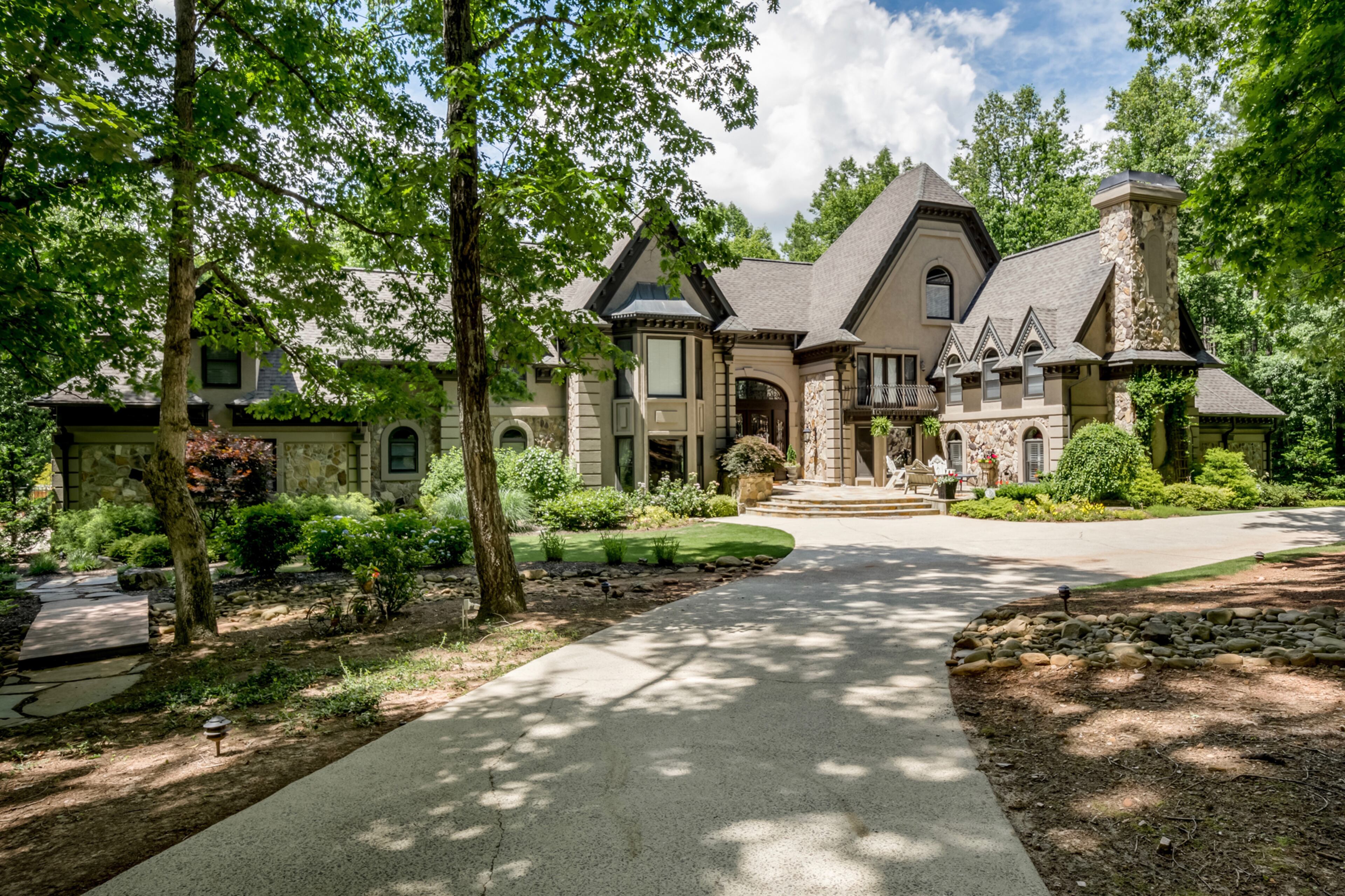 The home architecture is reminiscent of a grand European estate. Text by Melanie White.