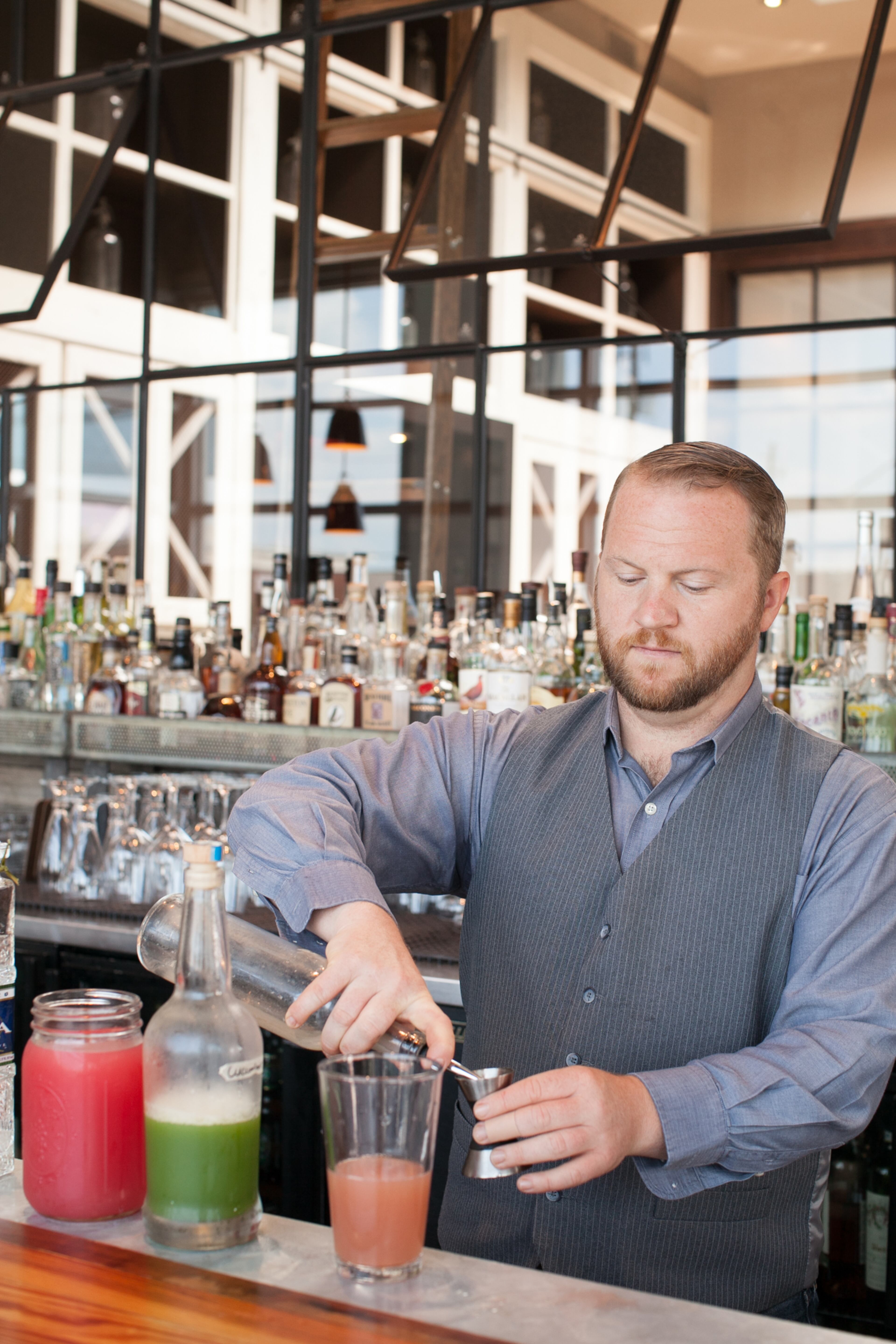 Miller Union bartender Stuart White makes a Summer Cooler of tequila, watermelon, cucumber and mint. (styling by Stuart White) (photo by Renee Brock / special)