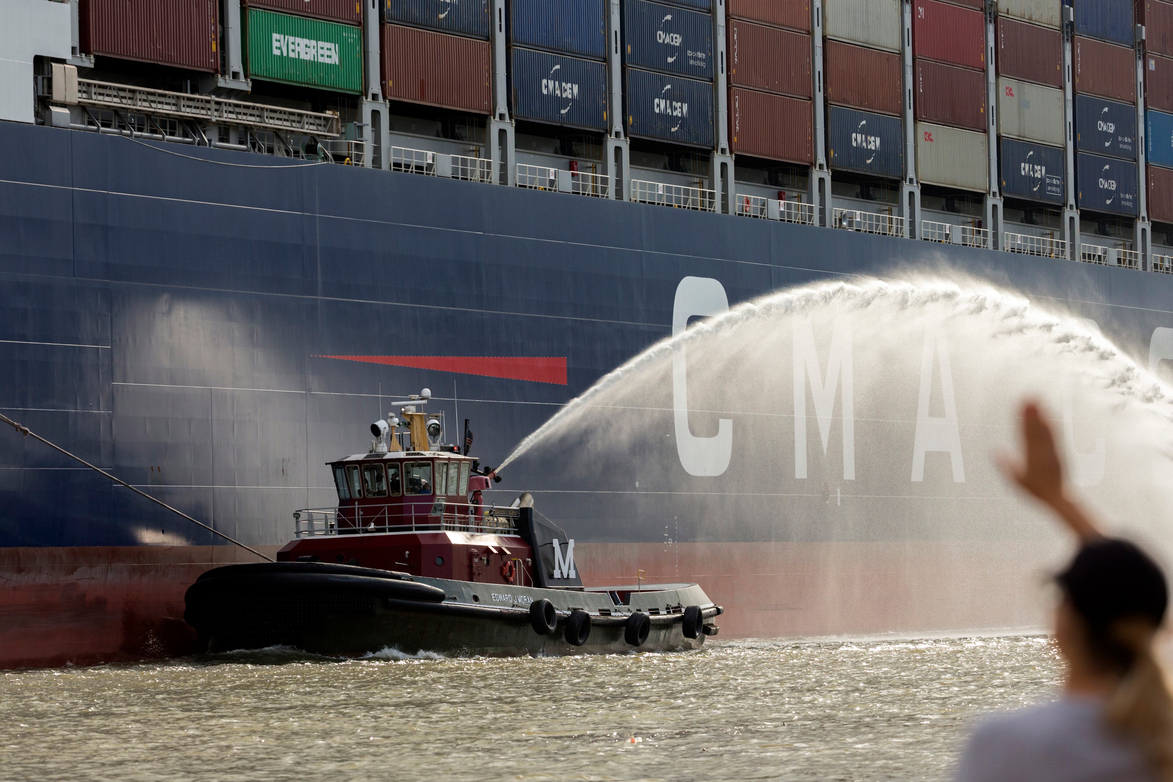 SAVANNAH, GA - SEPTEMBER 18, 2020: The Moran tugboat Edward J. Moran sprays water in celebration of the CMA CGM Brazil as it sails up the Savannah River to the Georgia Ports Authority's Garden City Terminal, Friday, Sept., 18, 2020, in Savannah, Ga. (AJC Photo/Stephen B. Morton)