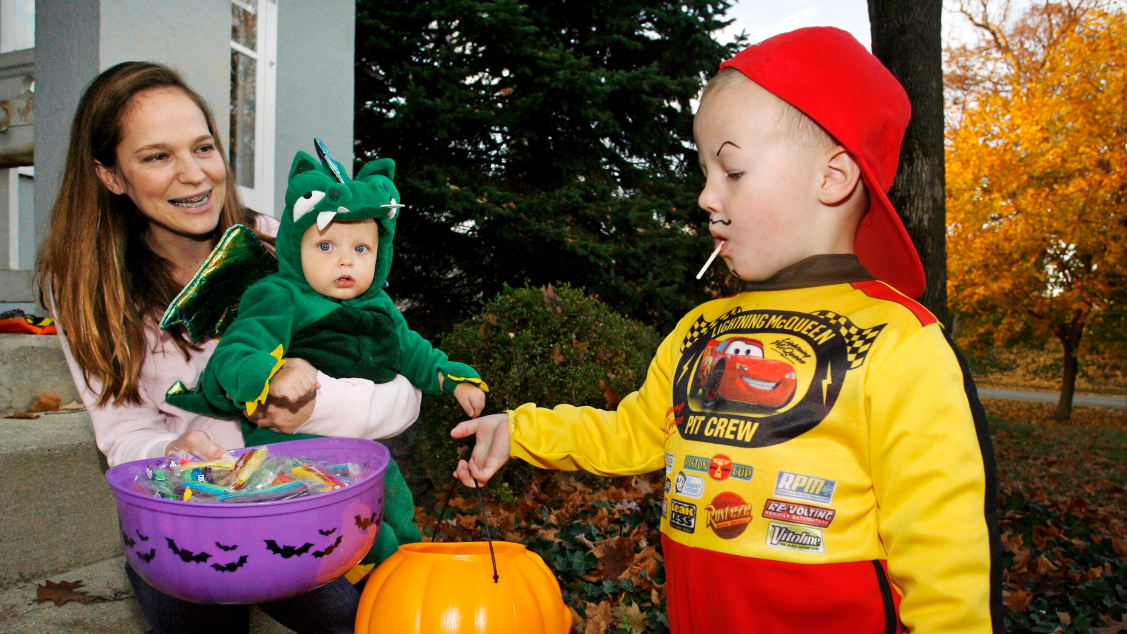 Springfield residents trick-or-treating on Pythian Avenue during Beggar’s Night. Staff Photo