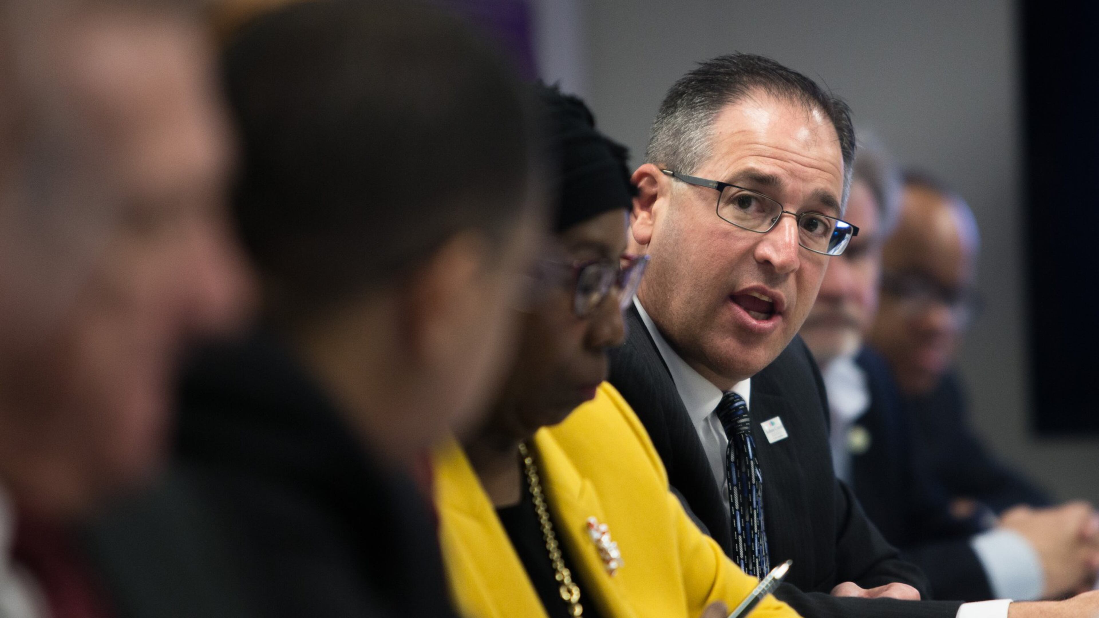 Johns Creek Mayor Mike Bodker, right, during a Fulton County transportation meeting. Bodker is seeking re-election this year.