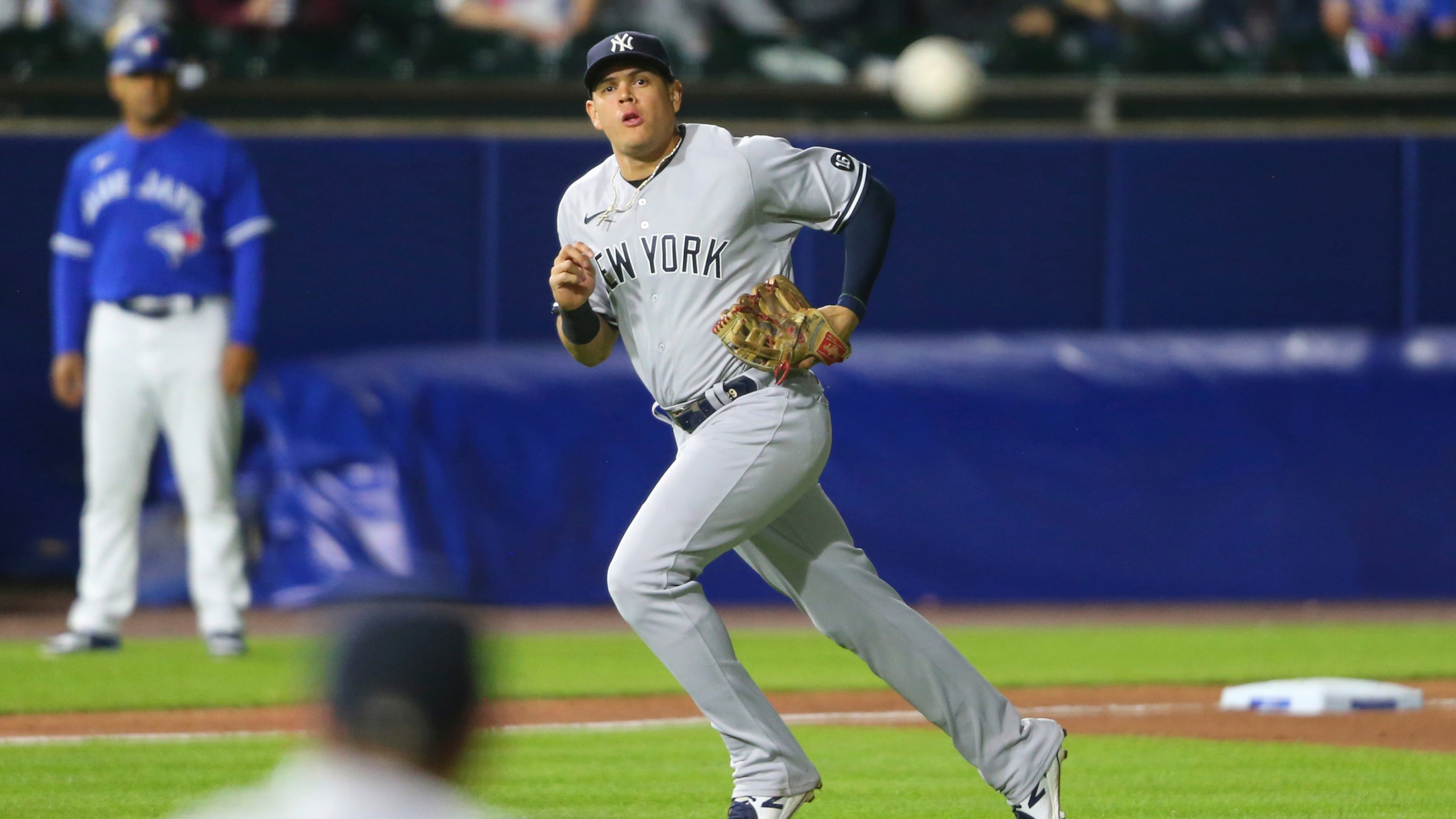FILE - New York Yankees third baseman Gio Urshela watches his throw to first for the out on Toronto Blue Jays' Bo Bichette during the eighth inning of a baseball game June 16, 2021, in Buffalo, N.Y. (AP Photo/Jeffrey T. Barnes, File)