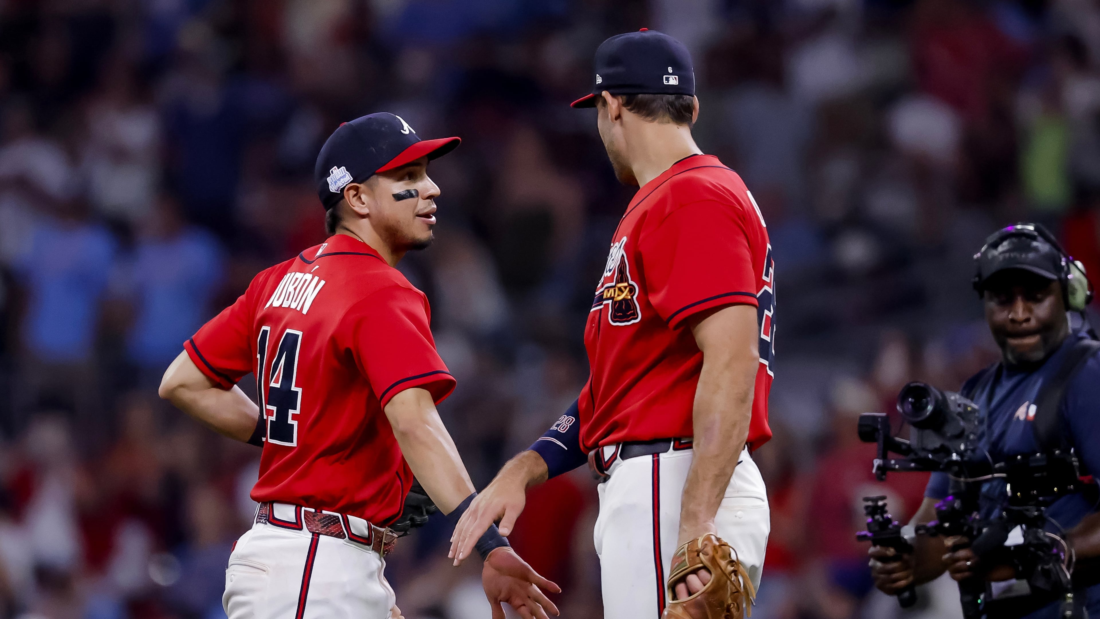 Atlanta Braves shortstop Mauricio Dubon, left, celebrates with third baseman Austin Riley, right, after their team defeated the Pittsburgh Pirates in a baseball game, Friday, June 5, 2026, in Atlanta. (AP Photo/Erik S. Lesser)