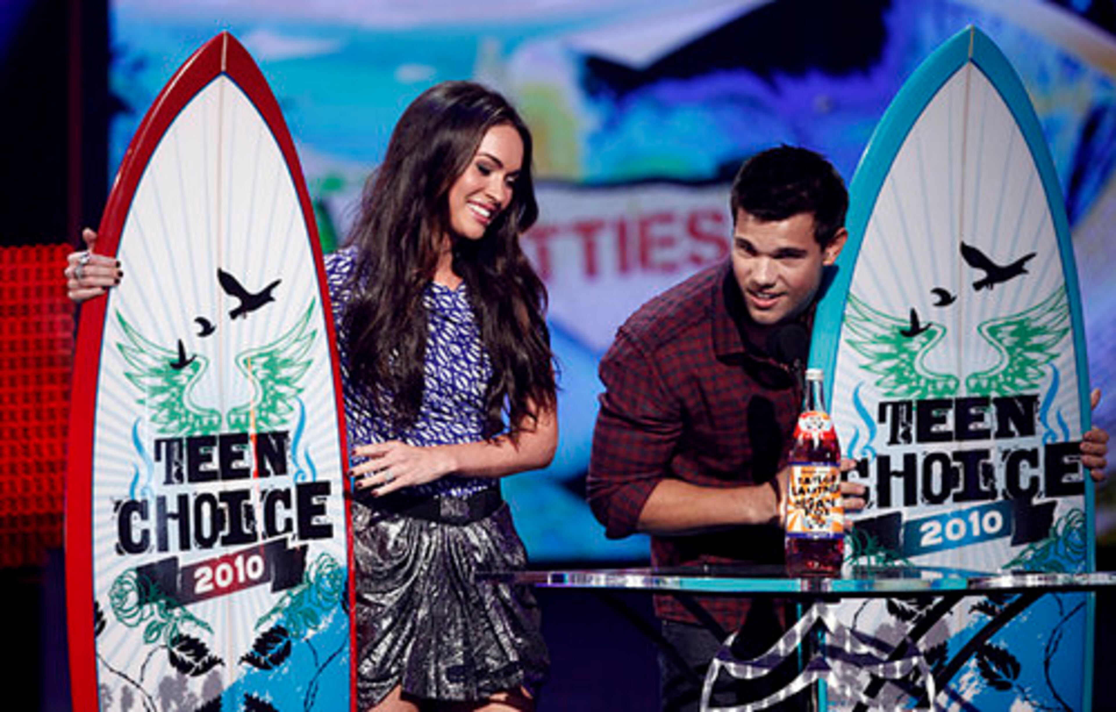 From left, Paul Wesley, Ian Somerhalder and Nina Dobrev of "Vampire Diaries" accept an award.