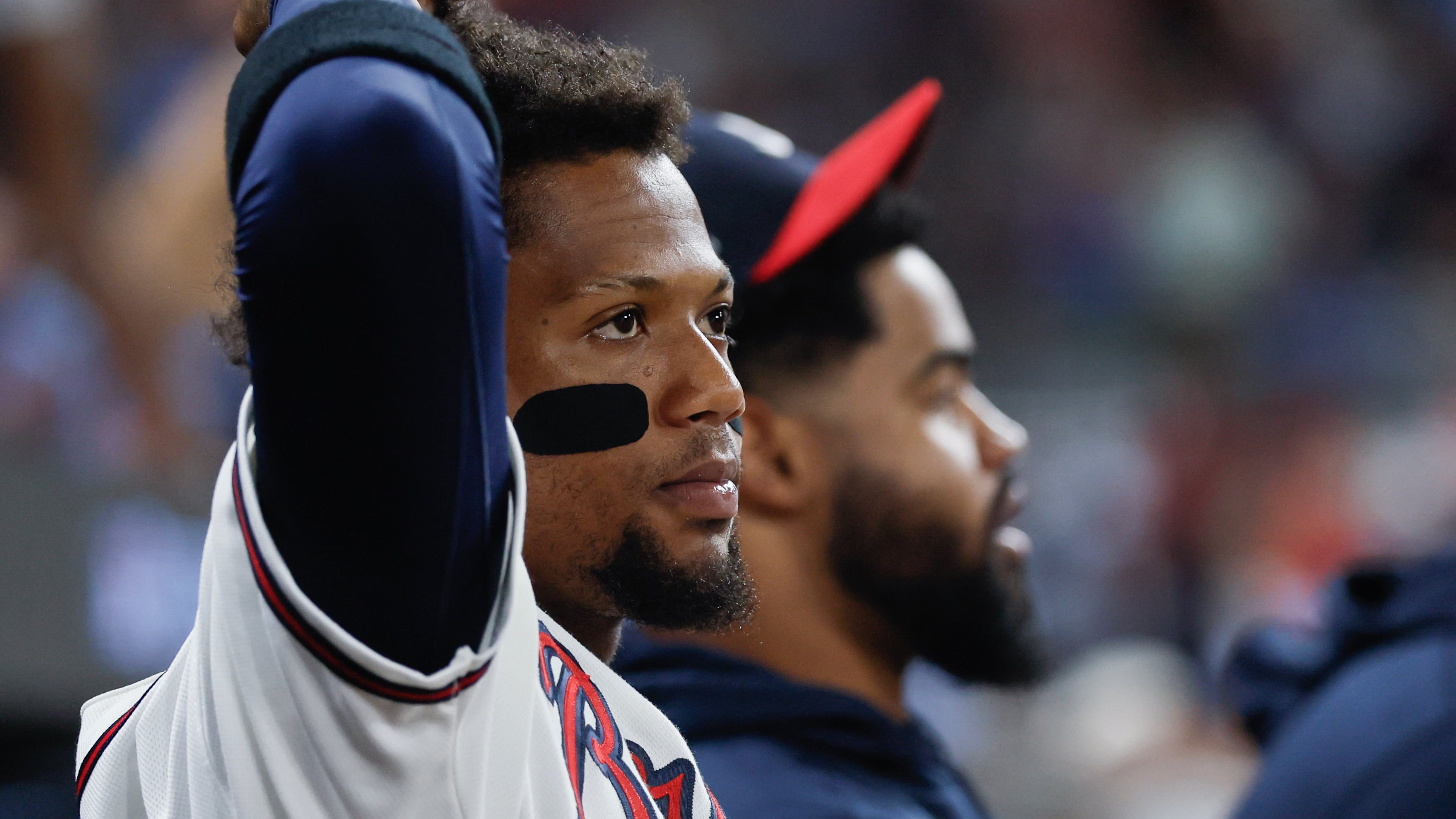Atlanta Braves right fielder Ronald Acuña Jr. watches in the dugout during the seventh inning of Game 4 of the MLB National League Division Series between the Atlanta Braves and the Los Angeles Dodgers, Wednesday, Oct. 7, 2026, in Atlanta. (Miguel Martinez/AJC)