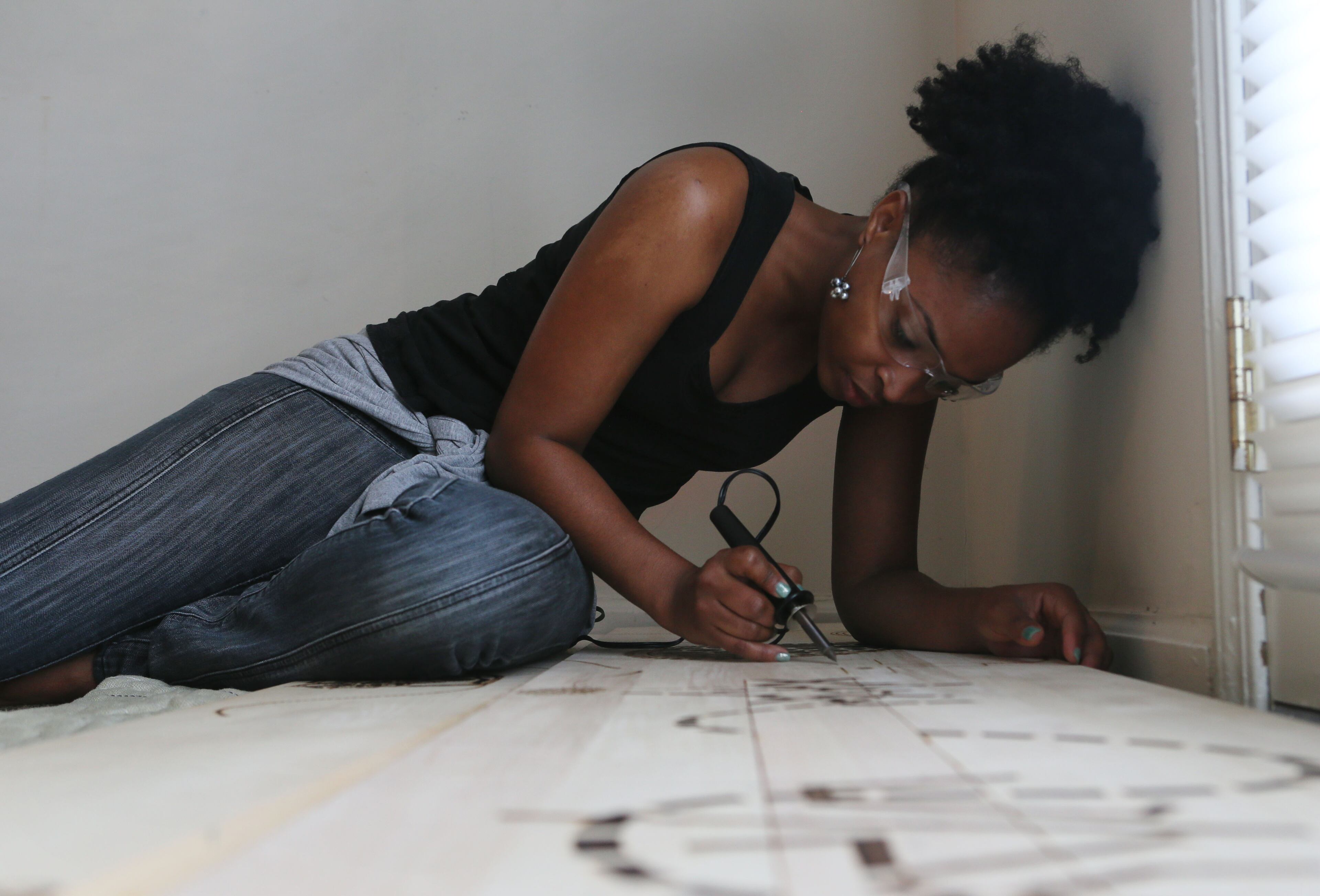 In her down time, Simon likes to create wood-burning art, which is both personal and religious in nature. She is also active in her church, Atlanta Metropolitan Christian Church, where she volunteers her time parking cars.