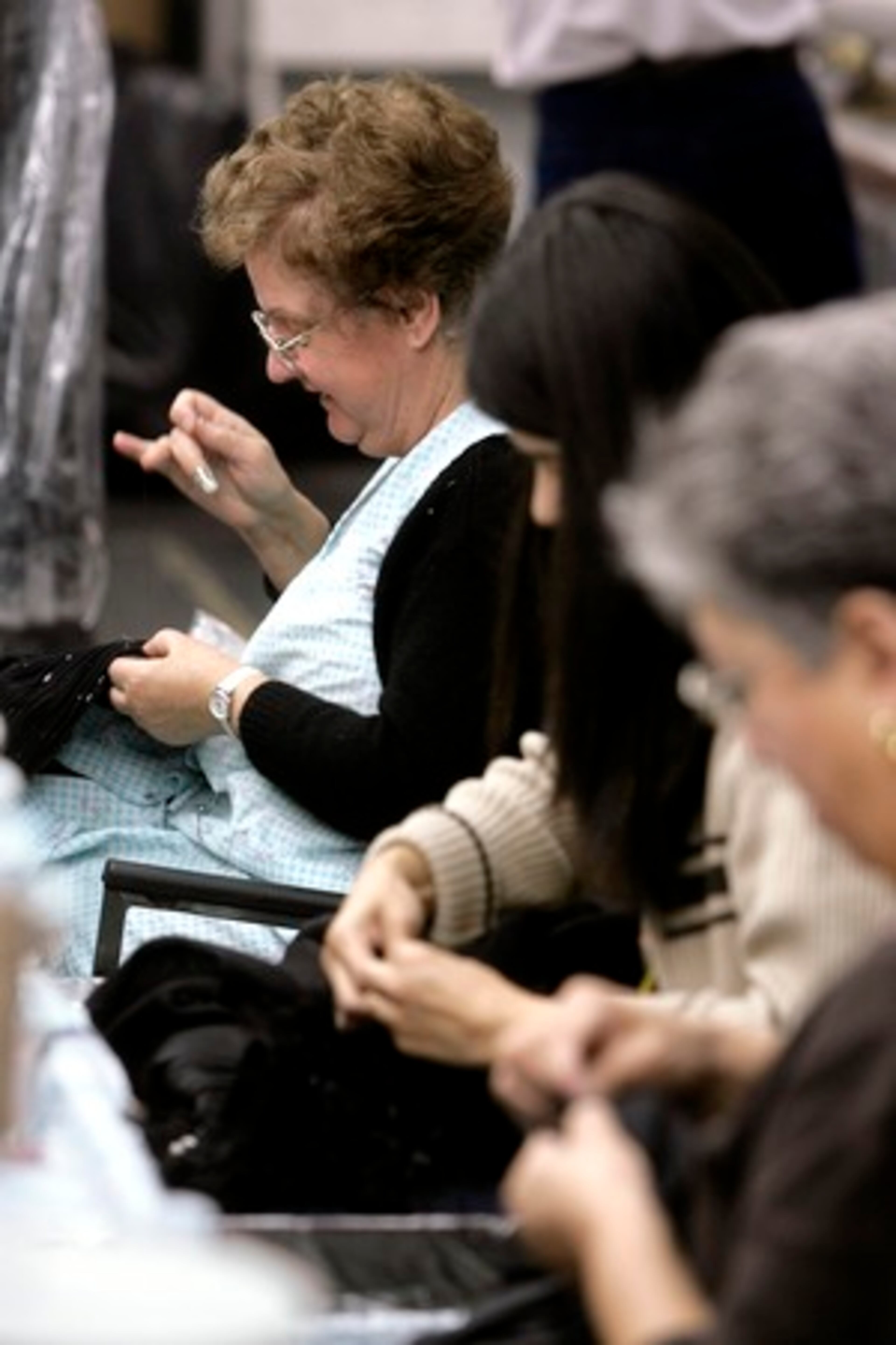Women sew at the Dalma Dress Manufacturing Co. factory.