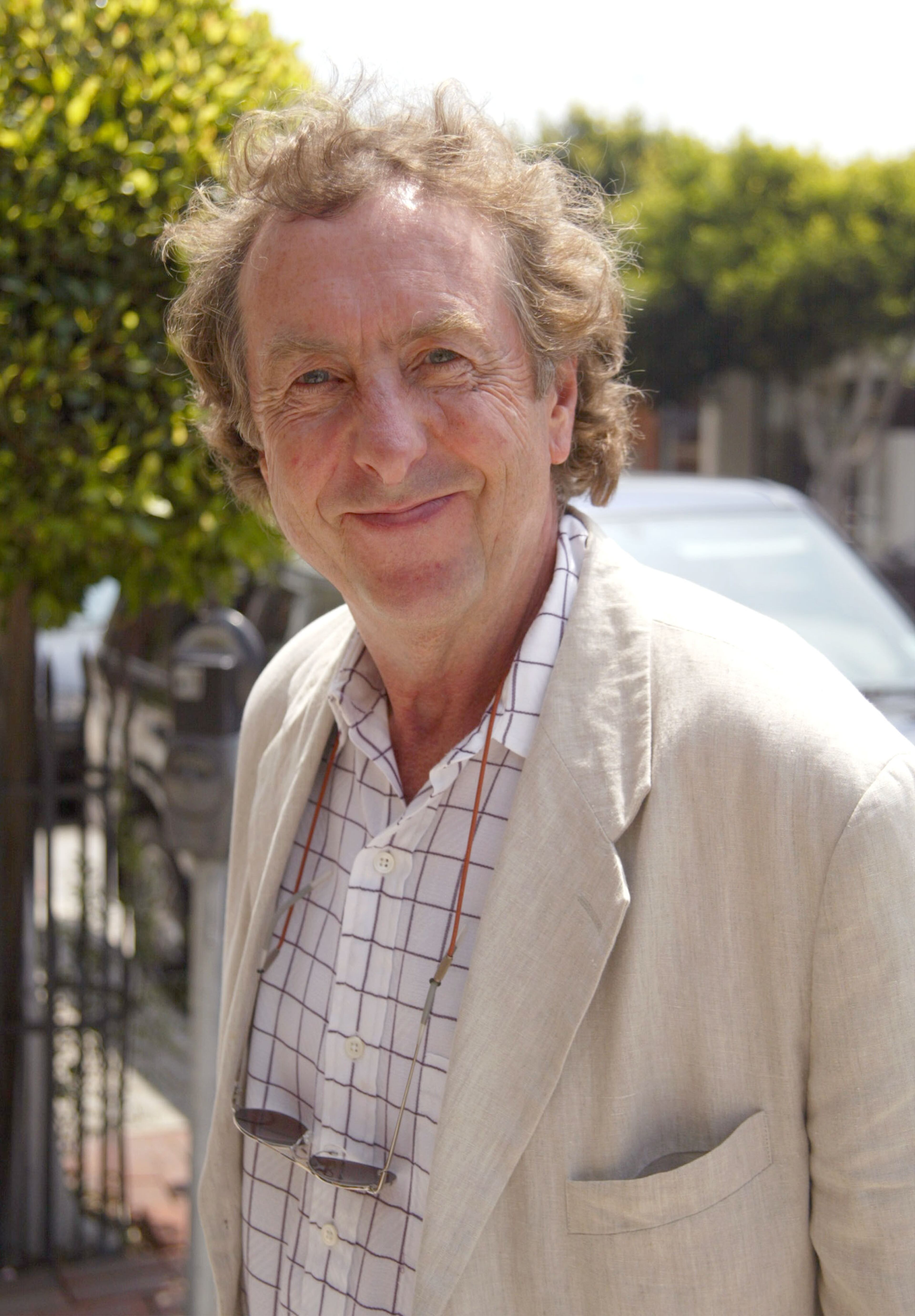Actor Eric Idle smiles for the photographer May 6, 2002 in Beverly Hills, CA. (Photo by Frazer Harrison/Getty Images)