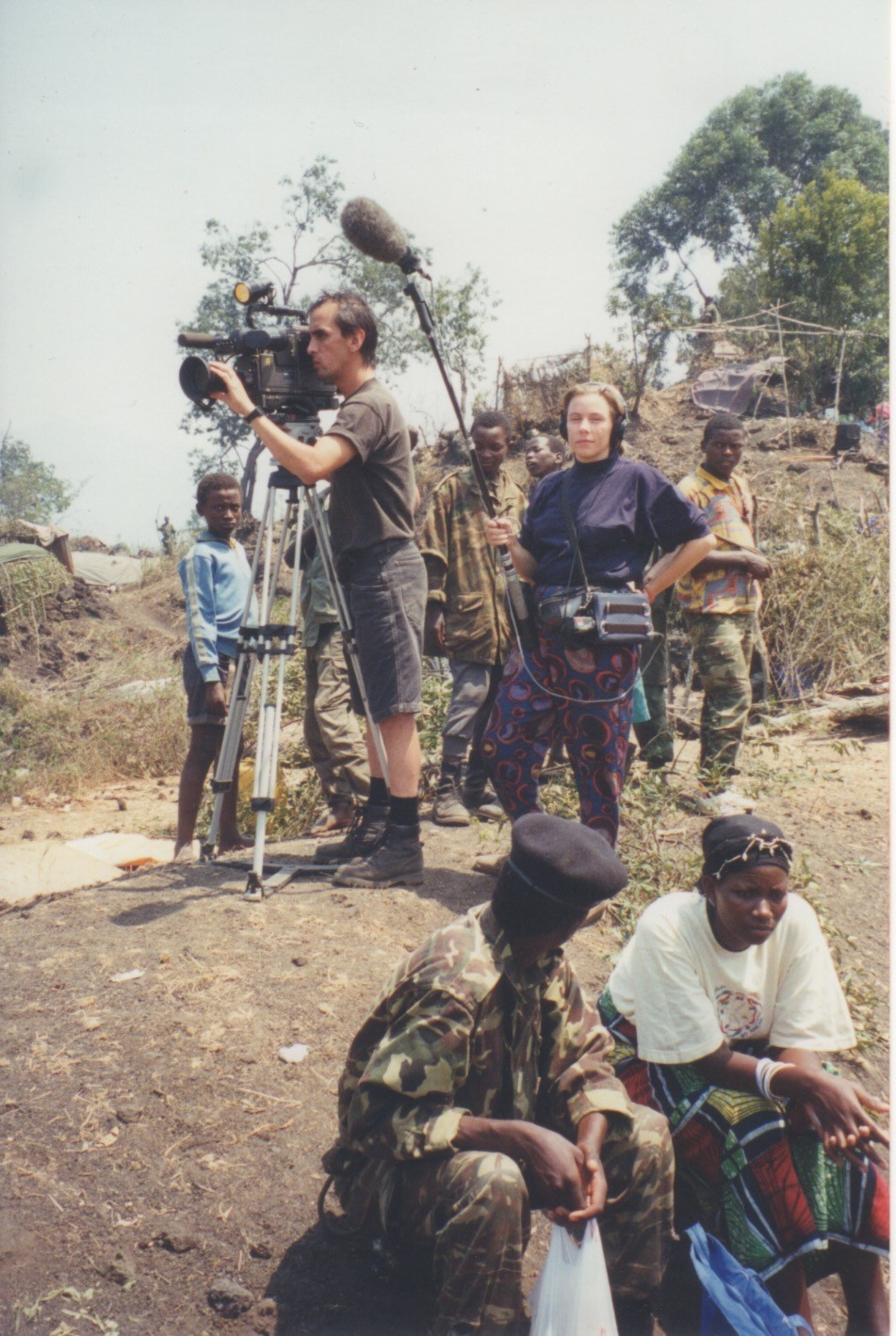 Elaine Widner (center) worked for CNN covering news events worldwide. Here,
Widner was part of a team covering the Rwandan genocide in 1994.