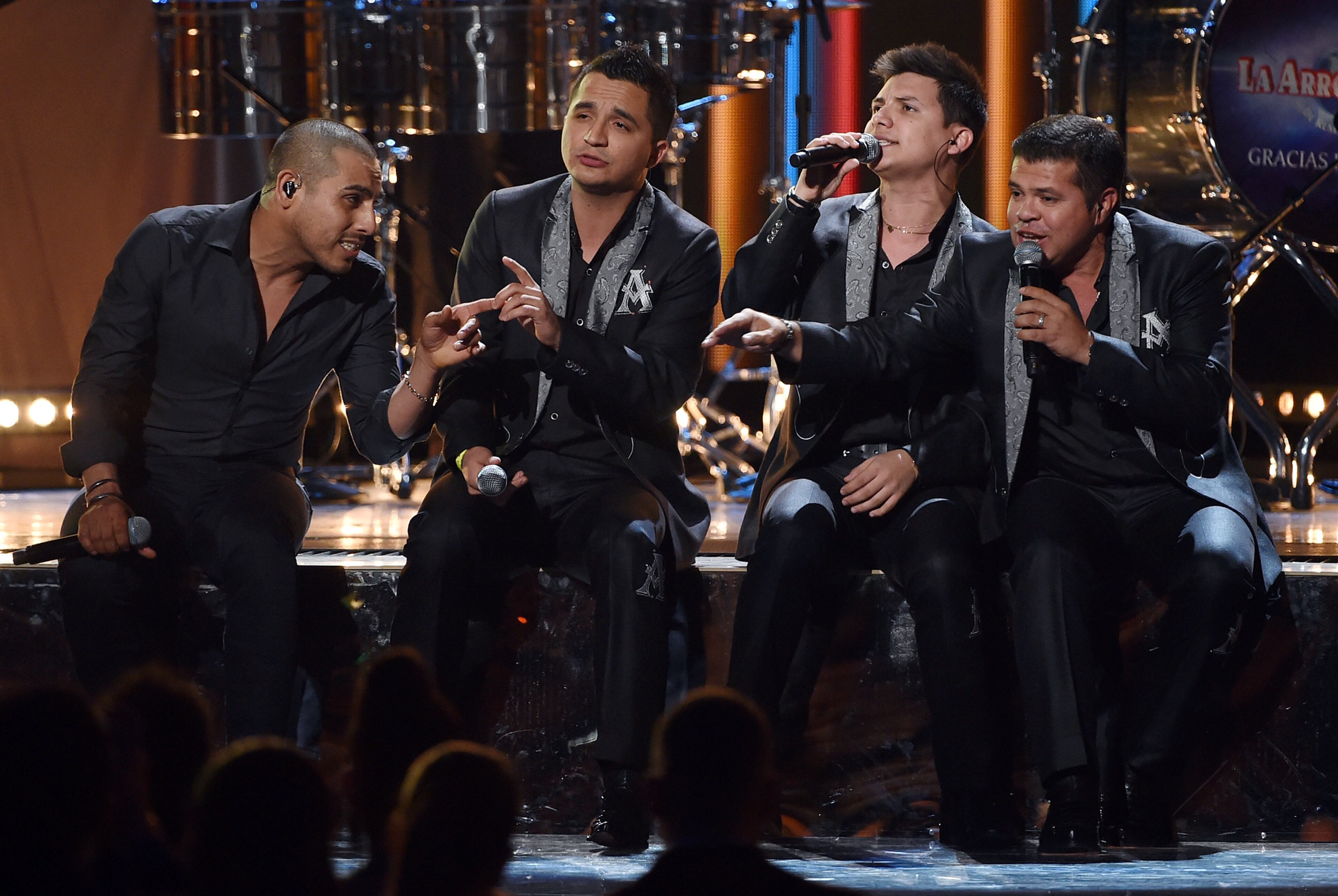 LAS VEGAS, NV - NOVEMBER 20: (L-R) Singers Espinoza Paz, Jose Isidro Beltran Cuen, Vincen Melendres Garcia and Jorge Luis Medina Ramos of La Arrolladora Banda El Limon performs during the 15th annual Latin GRAMMY Awards at the MGM Grand Garden Arena on November 20, 2014 in Las Vegas, Nevada. (Photo by Ethan Miller/Getty Images)