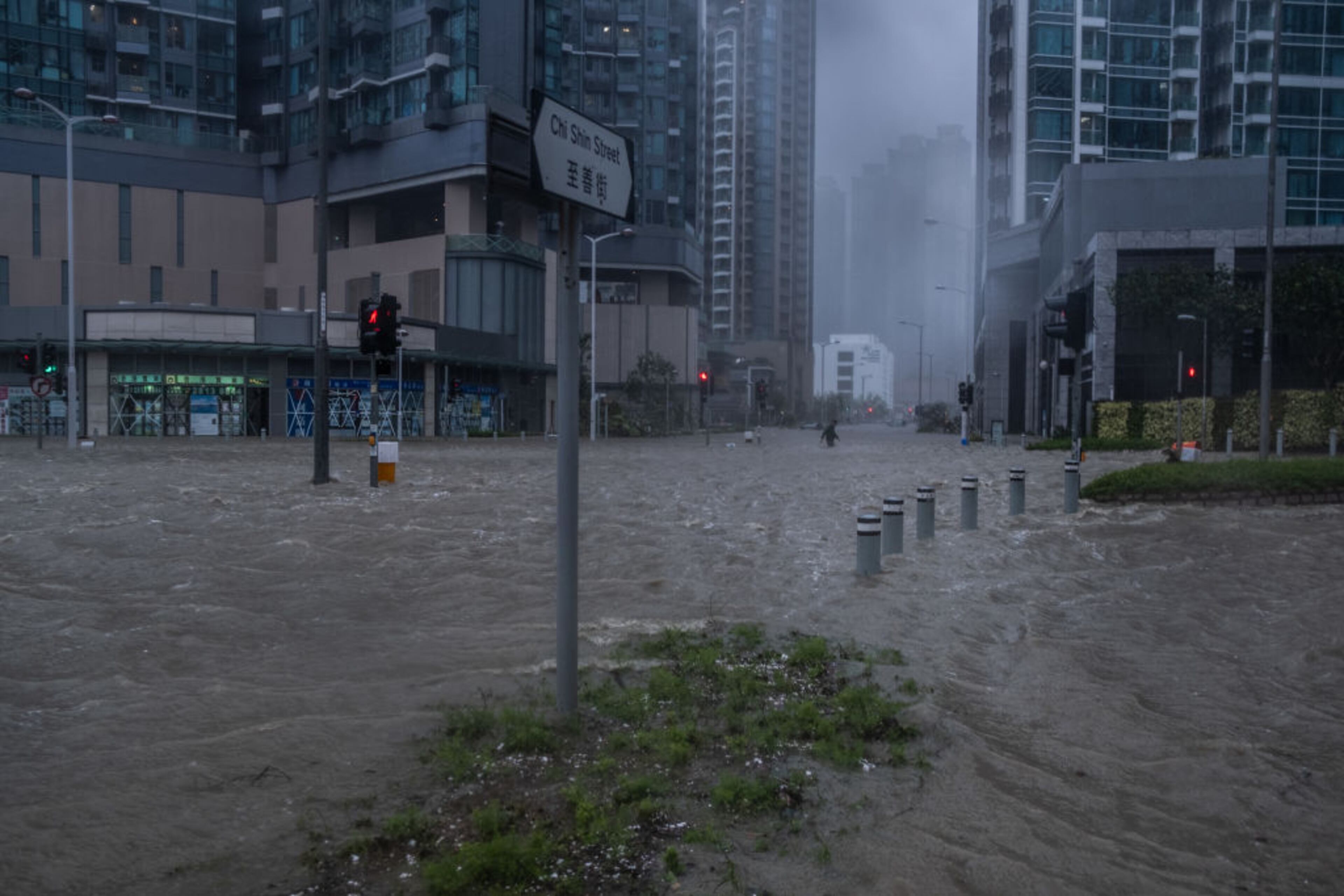 HONG KONG, HONG KONG - SEPTEMBER 16: Flooded road is seen on September 16, 2018 in Hong Kong, Hong Kong. City officials raised the storm alert to T10, it's highest level, as Typhoon Mangkhut landed on Hong Kong. The strongest tropical storm of the season so far, with winds as fast as 200 kilometres per hour, Mangkhut has reportedly killed at least 25 people in the Philippines as it continues it's path towards southern China. (Photo by Lam Yik Fei/Getty Images)