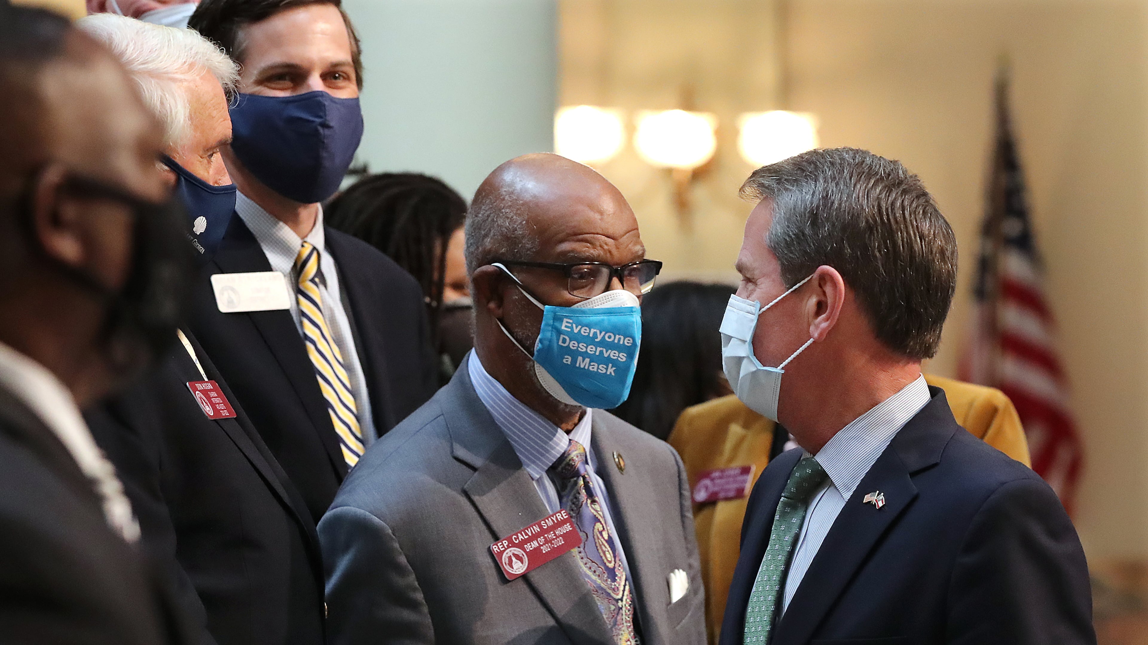 021621 Atlanta: Governor Brian Kemp (right) confers with Rep. Calvin Smyre (left), Dean of the House, during a press conference announcing the overhaul of Georgia’s citizen’s arrest statute at the capitol on Tuesday, Feb 16, 2021, in Atlanta. Curtis Compton / Curtis.Compton@ajc.com”