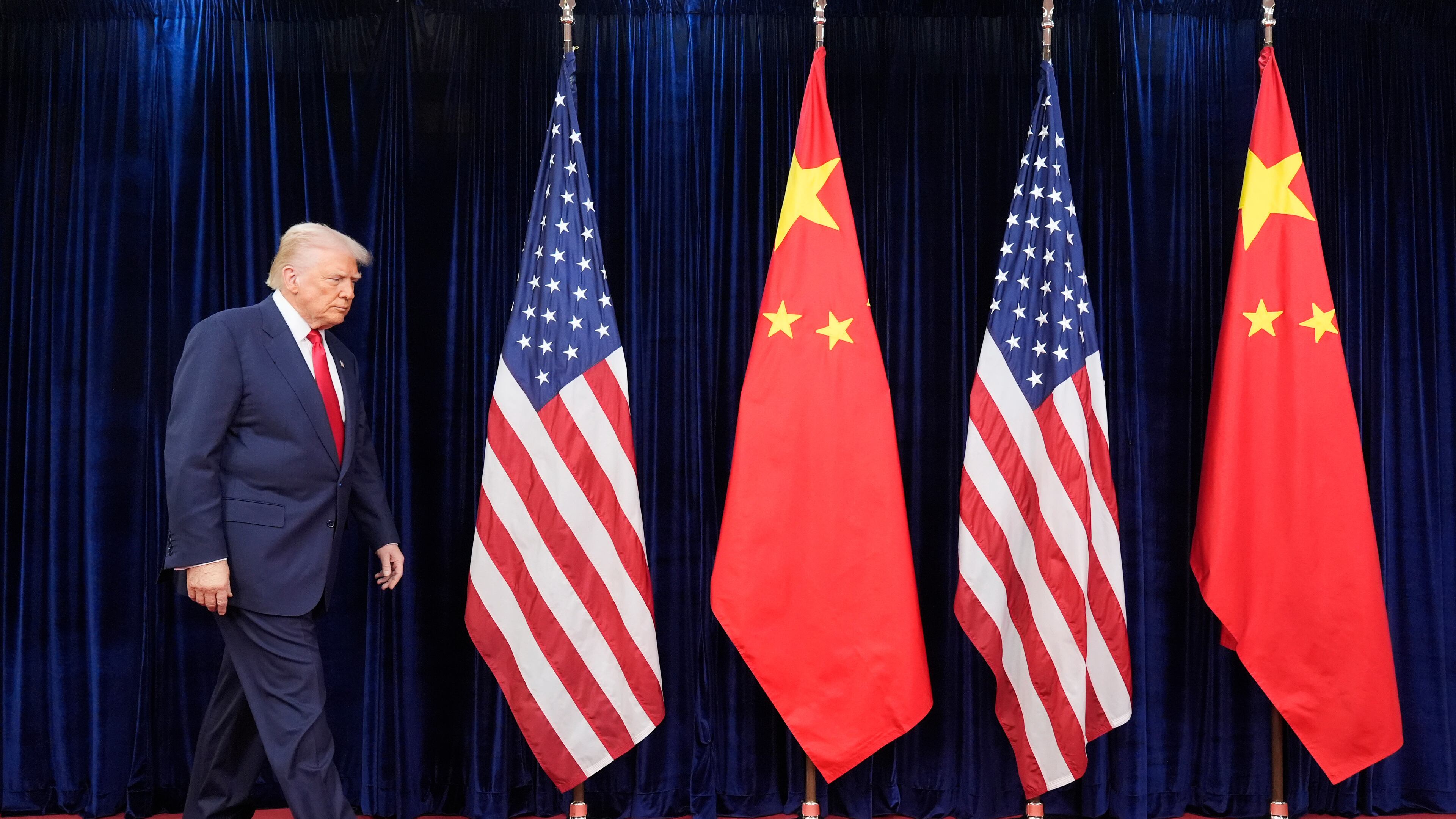 President Donald Trump — pictured walking in for his meeting with Chinese President Xi Jinping in South Korea on Thursday, Oct. 30, 2025 — wrote on his social platform before the meeting that he has "instructed the Department of War to start testing our Nuclear Weapons on an equal basis." (Mark Schiefelbein/AP)
