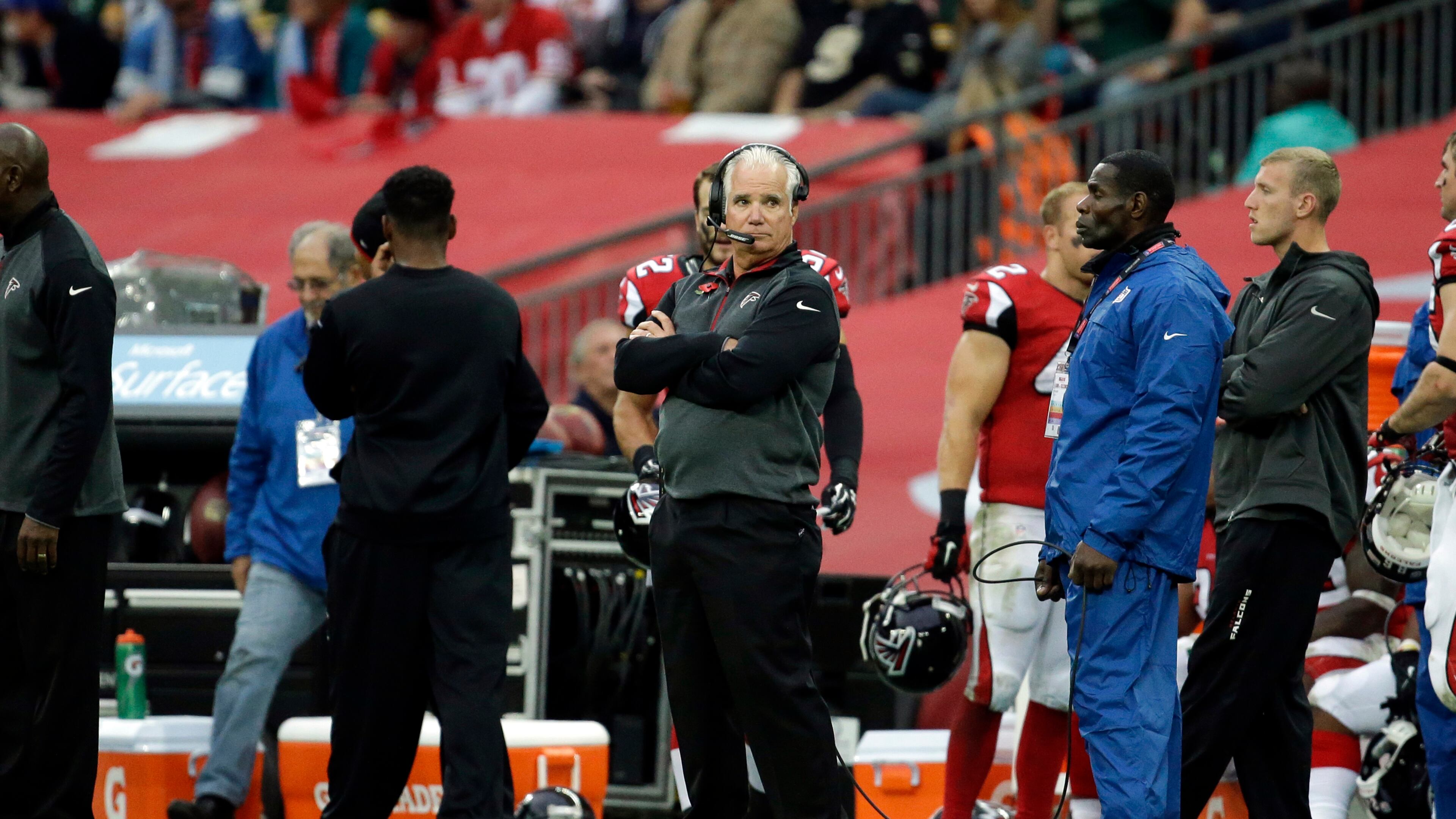 Atlanta Falcons head coach Mike Smith watches from the sideline in the second half of the NFL football game against the Detroit Lions at Wembley Stadium, London, Sunday, Oct. 26, 2014. (AP Photo/Matt Dunham) Mike Smith made some poor decisions down stretch Sunday. (AP photo)