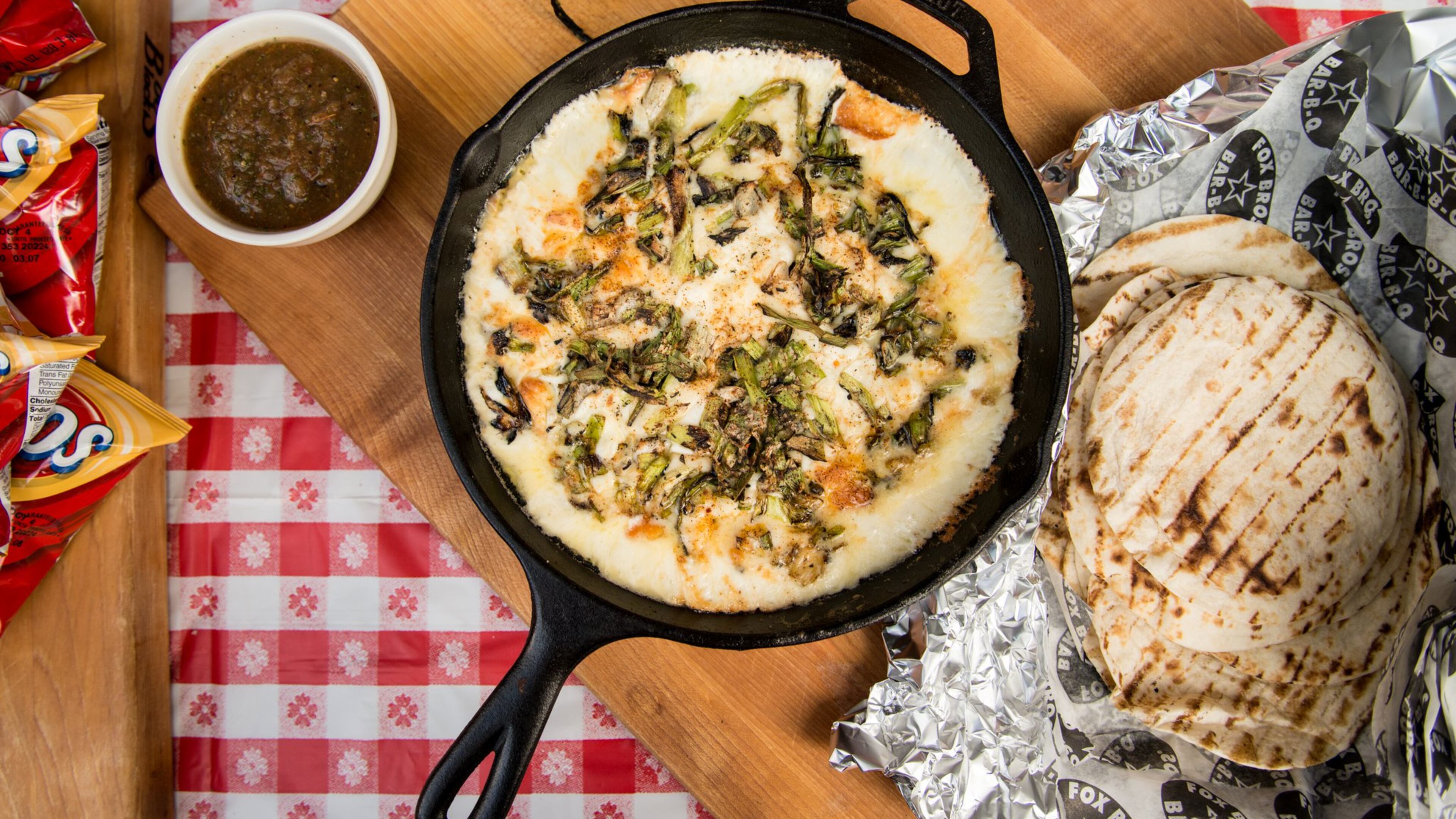 Grilled Fundido with Charred Green Onions. Photo Credit- Mia Yakel.