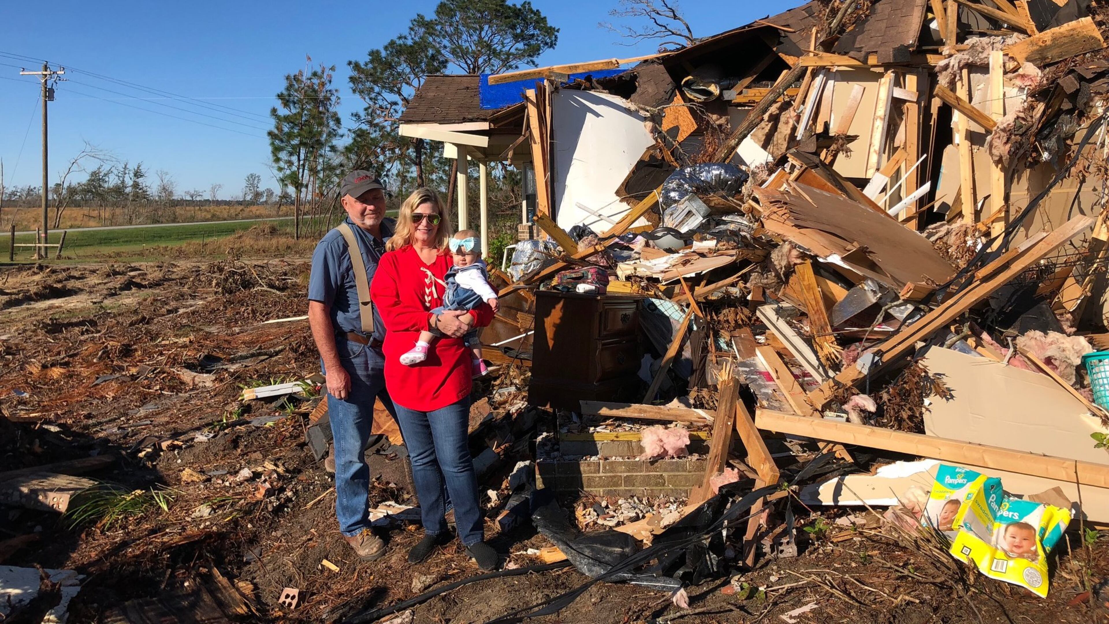 Hurricane Michael survivors in Colquitt, Ga. John Edward Wells with wife Marianne Wells and their granddaughter Maddie. (Joshua Sharpe/joshua.sharpe@ajc.com)