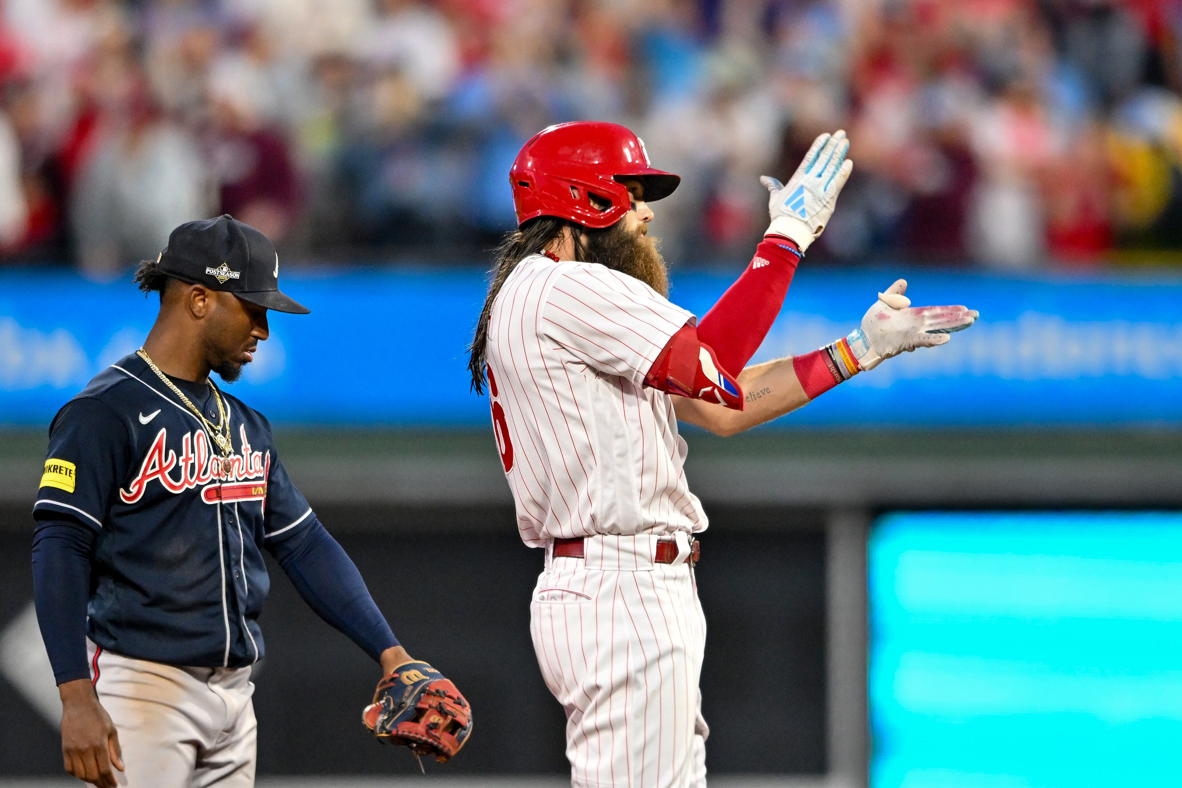 Philadelphia Phillies’ Nick Castellanos fires up his teammates after a double against the Atlanta Braves during the fourth inning of NLDS Game 3 in Philadelphia on Wednesday, Oct. 11, 2023. (Hyosub Shin / Hyosub.Shin@ajc.com)