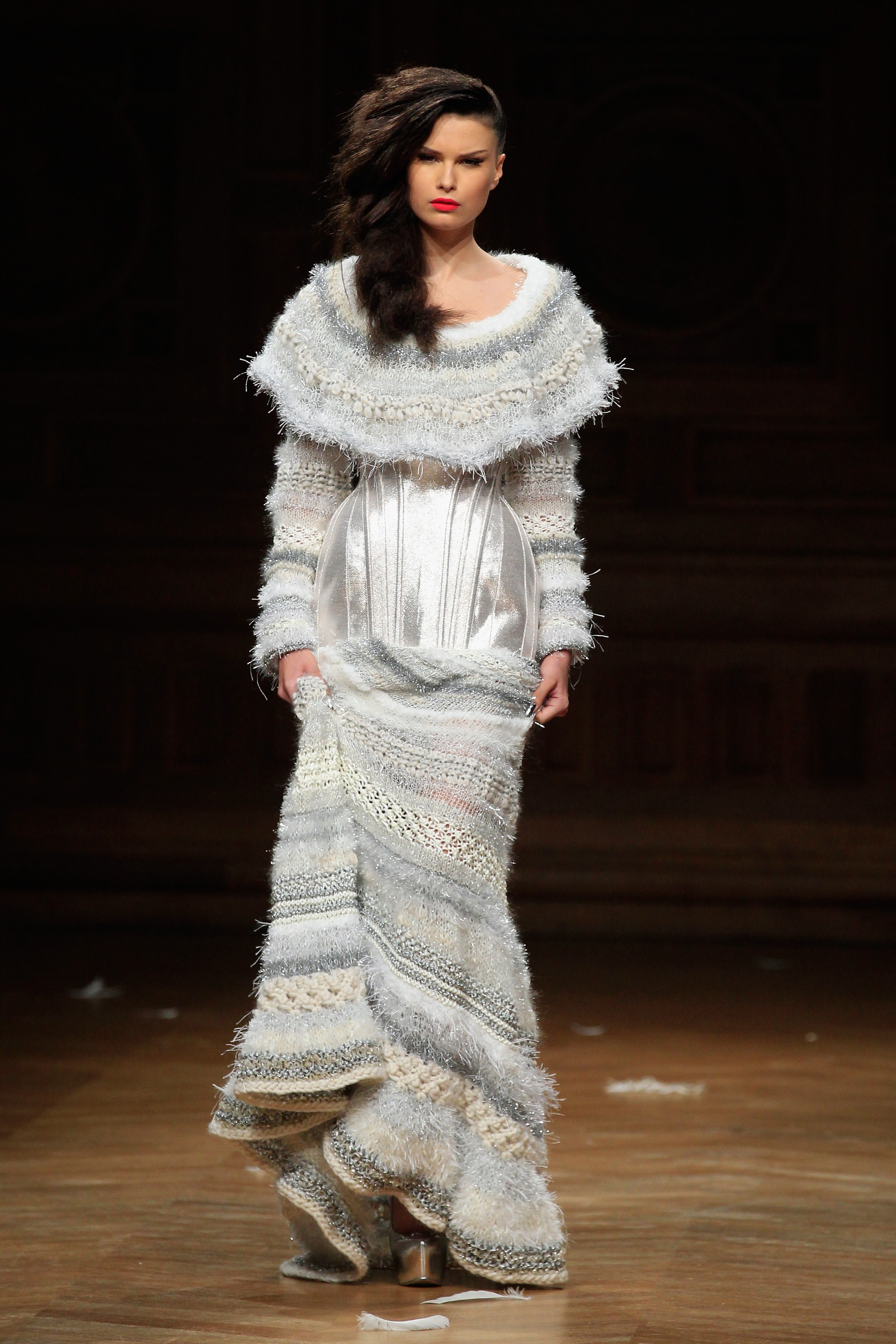 PARIS, FRANCE - JULY 10: A model walks the runway during the Serkan Cura show as part of Paris Fashion Week - Haute Couture Fall/Winter 2014-2015 at Mairie du 4e on July 10, 2014 in Paris, France. (Photo by Thierry Chesnot/Getty Images)