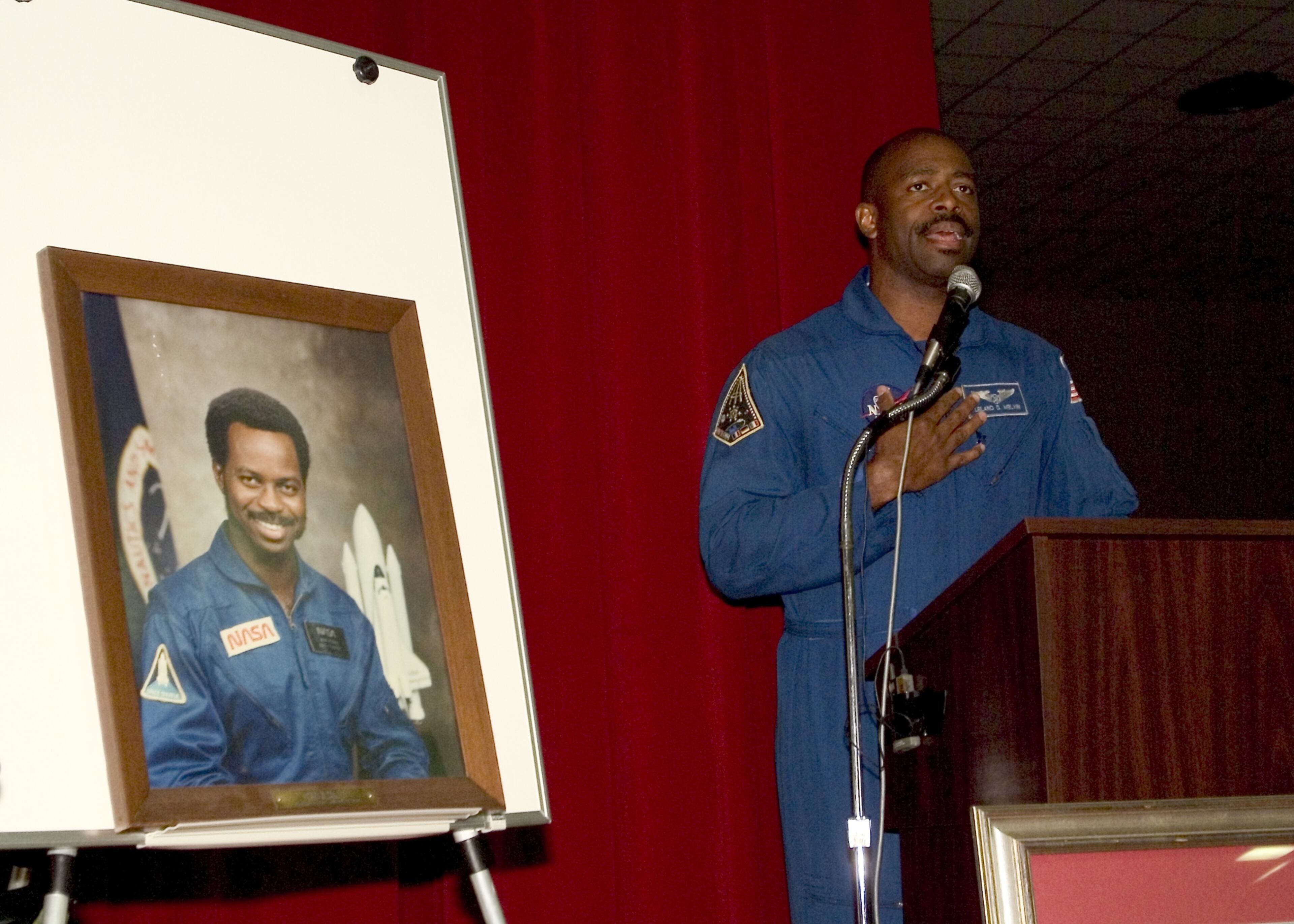 NASA astronaut Leland Melvin speaks at DeKalb's McNair High School in this 2004 photo. Ronald McNair was the second African-American in space.