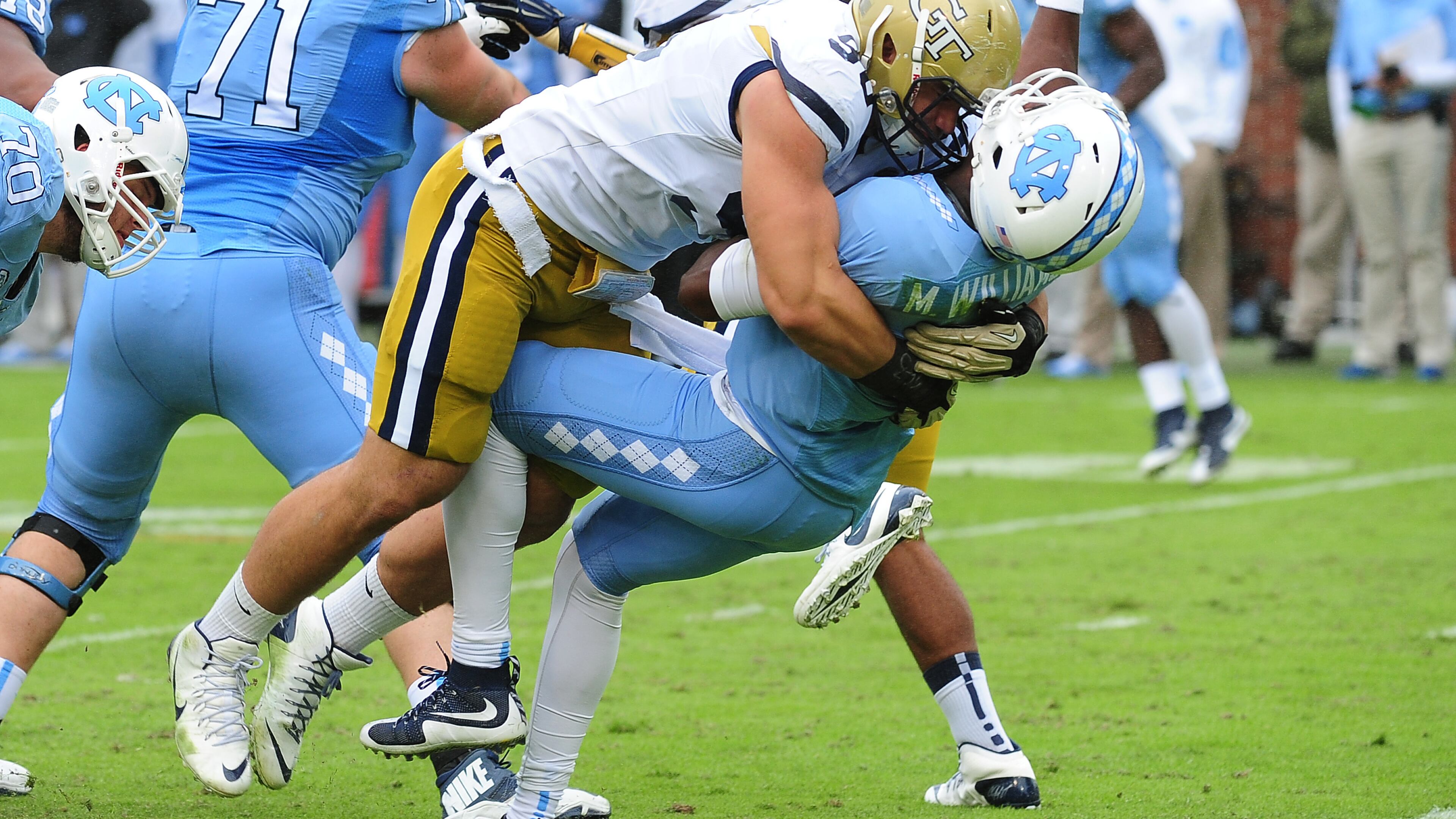 Georgia Tech defensive tackle Adam Gotsis was disqualified for this hit on North Carolina quarterback Marquise Williams in Saturday’s game, a 38-31 defeat for Tech. (Photo by Scott Cunningham/Getty Images)
