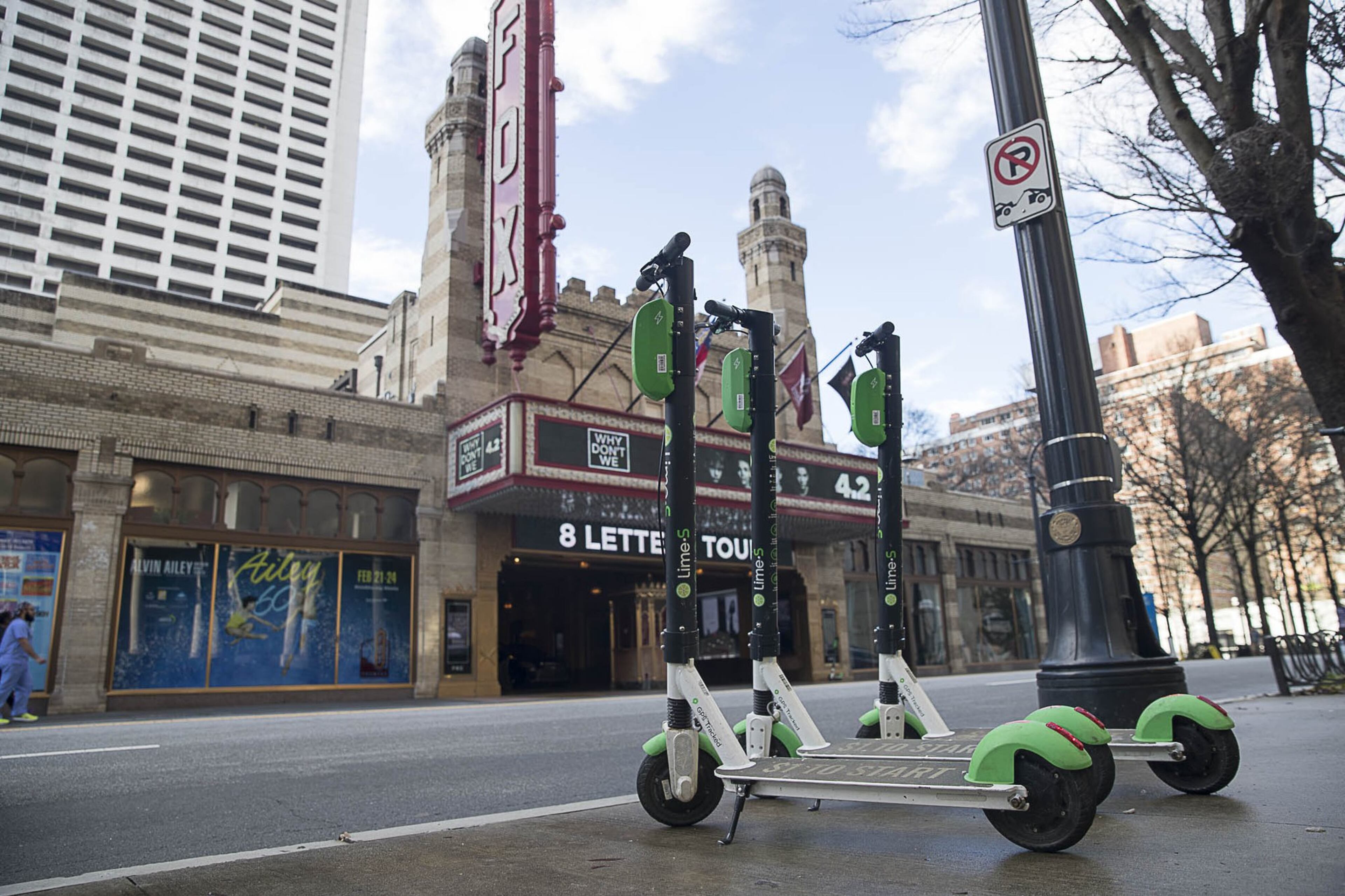 Lime Scooters are parked on the sidewalk across the street from The Fox Theater in Atlanta’s Midtown community, Friday, January 4, 2019. (ALYSSA POINTER/ALYSSA.POINTER@AJC.COM)
