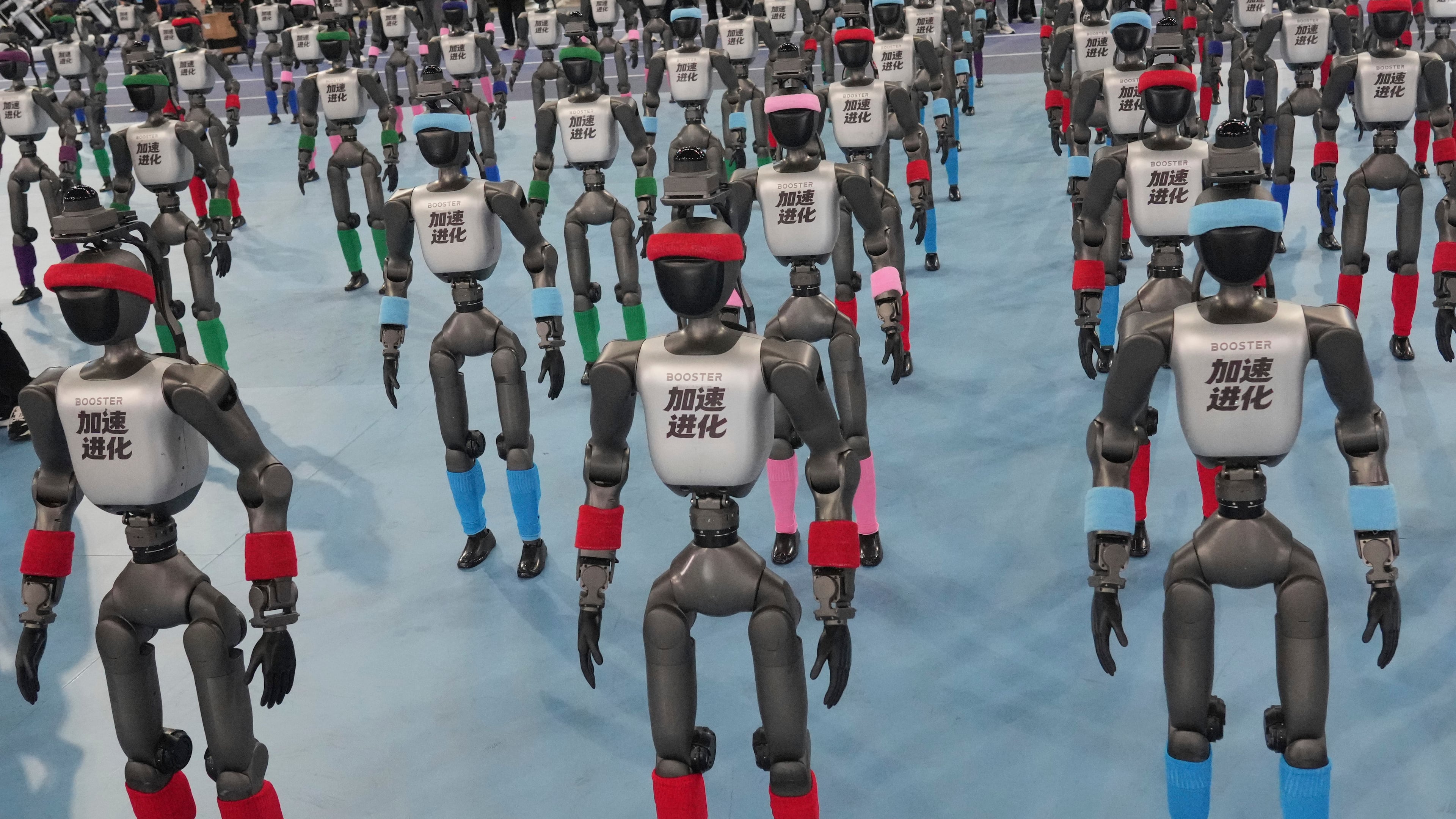 Robots are prepared ahead the opening ceremony of the World Humanoid Robot Games in Beijing, Saturday, Aug. 22, 2026. (AP Photo/Achmad Ibrahim)