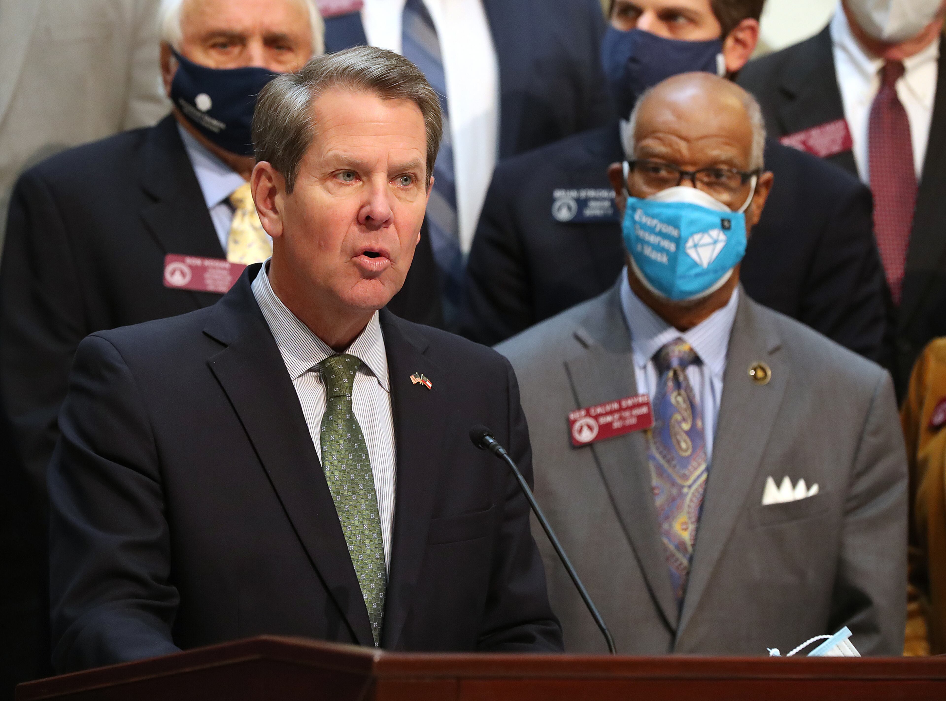 021621 Atlanta: Governor Brian Kemp announces the overhaul of Georgia’s citizen’s arrest statute at the capitol with Rep. Calvin Smyre (right), Dean of the House, looking on Tuesday, Feb 16, 2021, in Atlanta. Curtis Compton / Curtis.Compton@ajc.com”