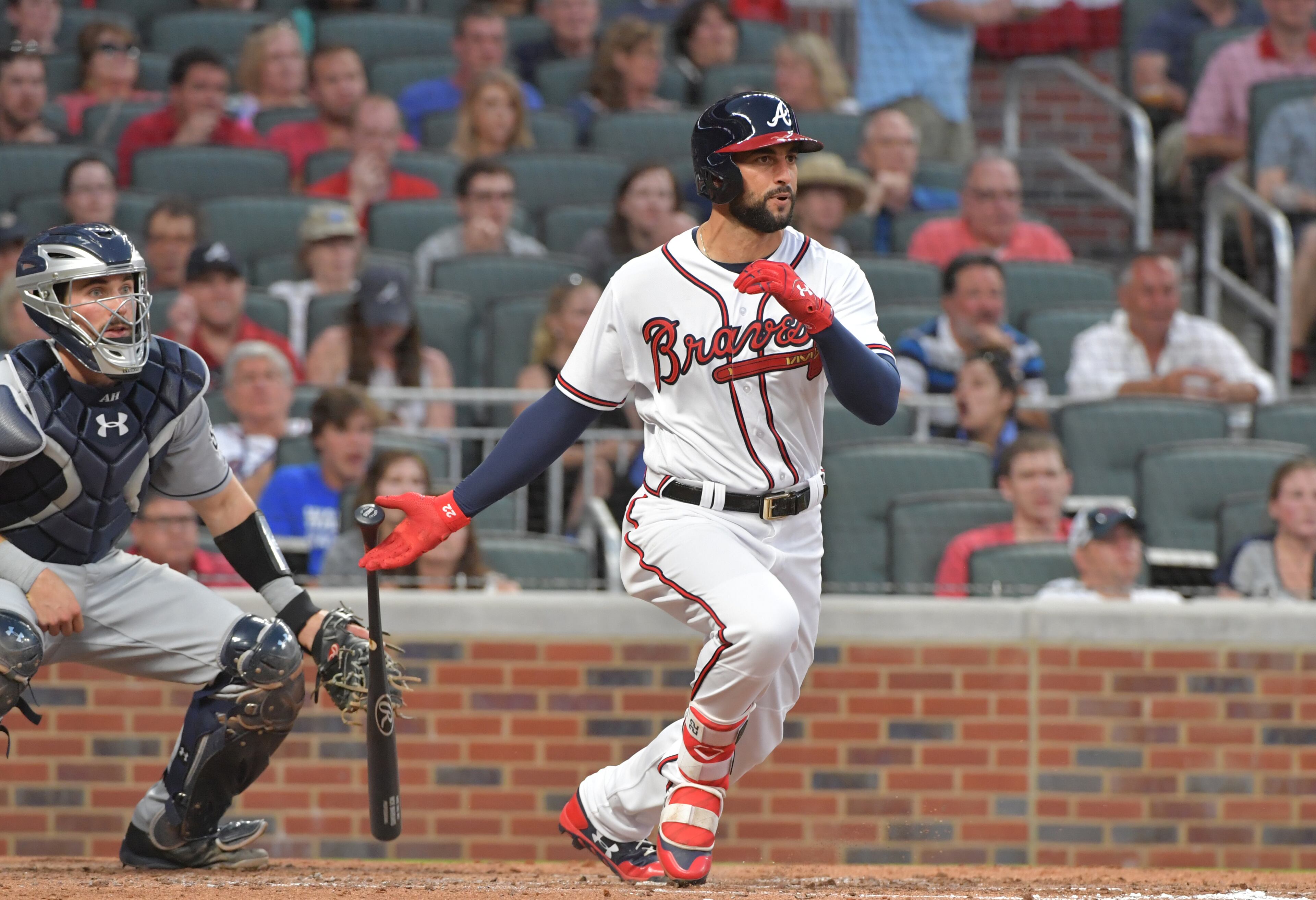 Nick Markakis hits a RBI single in third inning at SunTrust Park on Saturday, April 15, 2017.