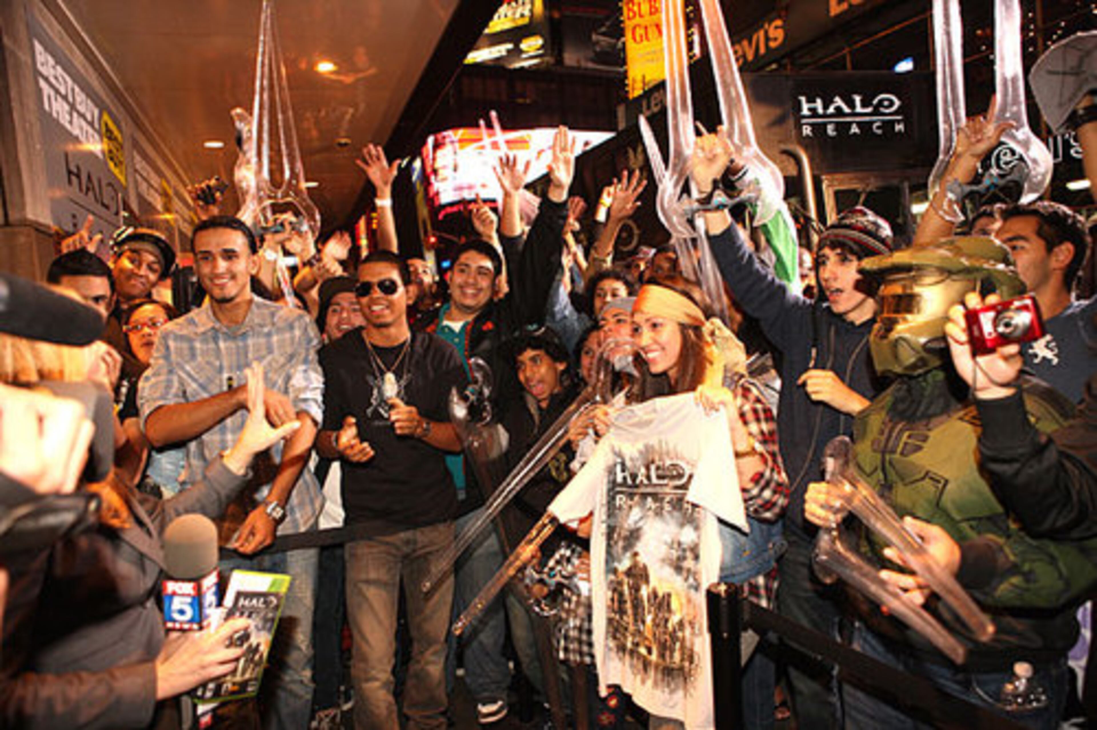 Fans gather around the block for the midnight launch of "Halo: Reach" at the new Best Buy Theater, Tuesday, Sep. 14, 2010, in New York.