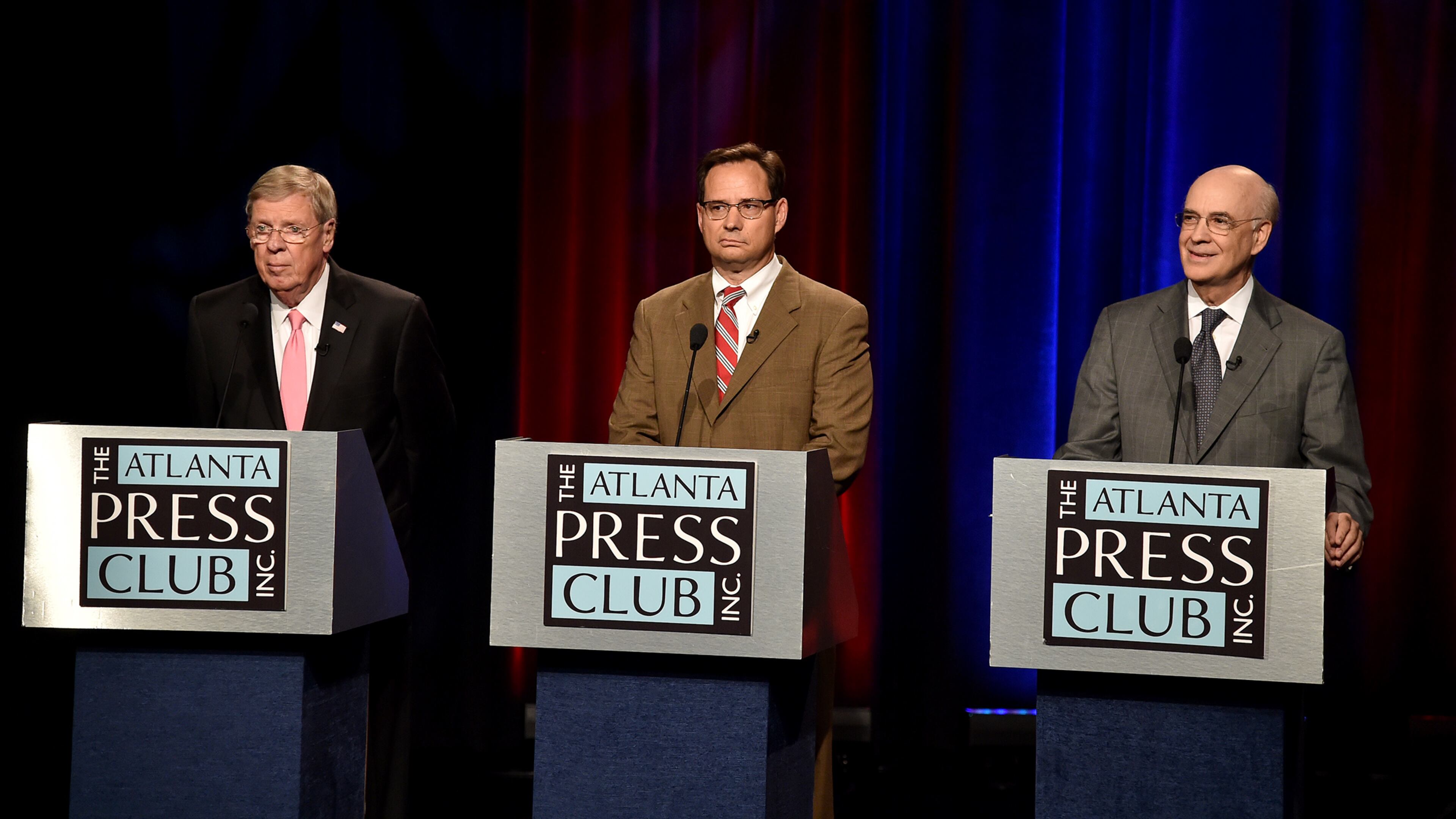 A file photo from last month’s U.S. Senate debate among GOP incumbent U.S. Sen. Johnny Isakson (left) Libertarian Allen Buckley (center) and Democrat Jim Barksdale. Brant Sanderlin, bsanderlin@ajc.com