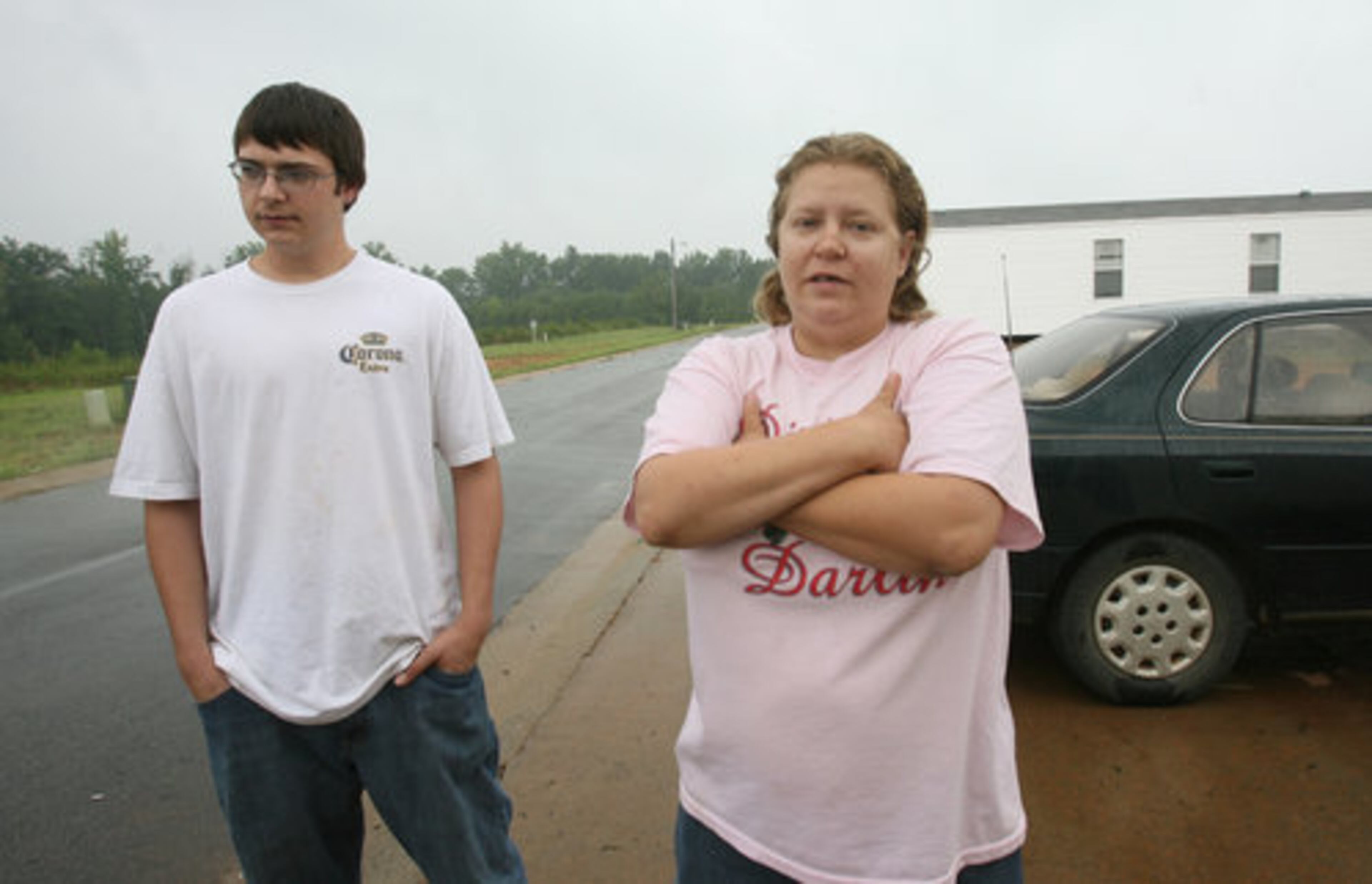 Kent Carey, 18, and his cousin Sonya Savage,29, were neighbors of Raymond Daniel Thurmond. Thurmond apparently guarded his privacy, said Savage. She only saw her neighbor occasionally, she recalled, and they didn't talk. "Just think: that went on right there," she said, pointing at the tan trailer where Thurmond lived for nearly three years. "And I lived next to it."
