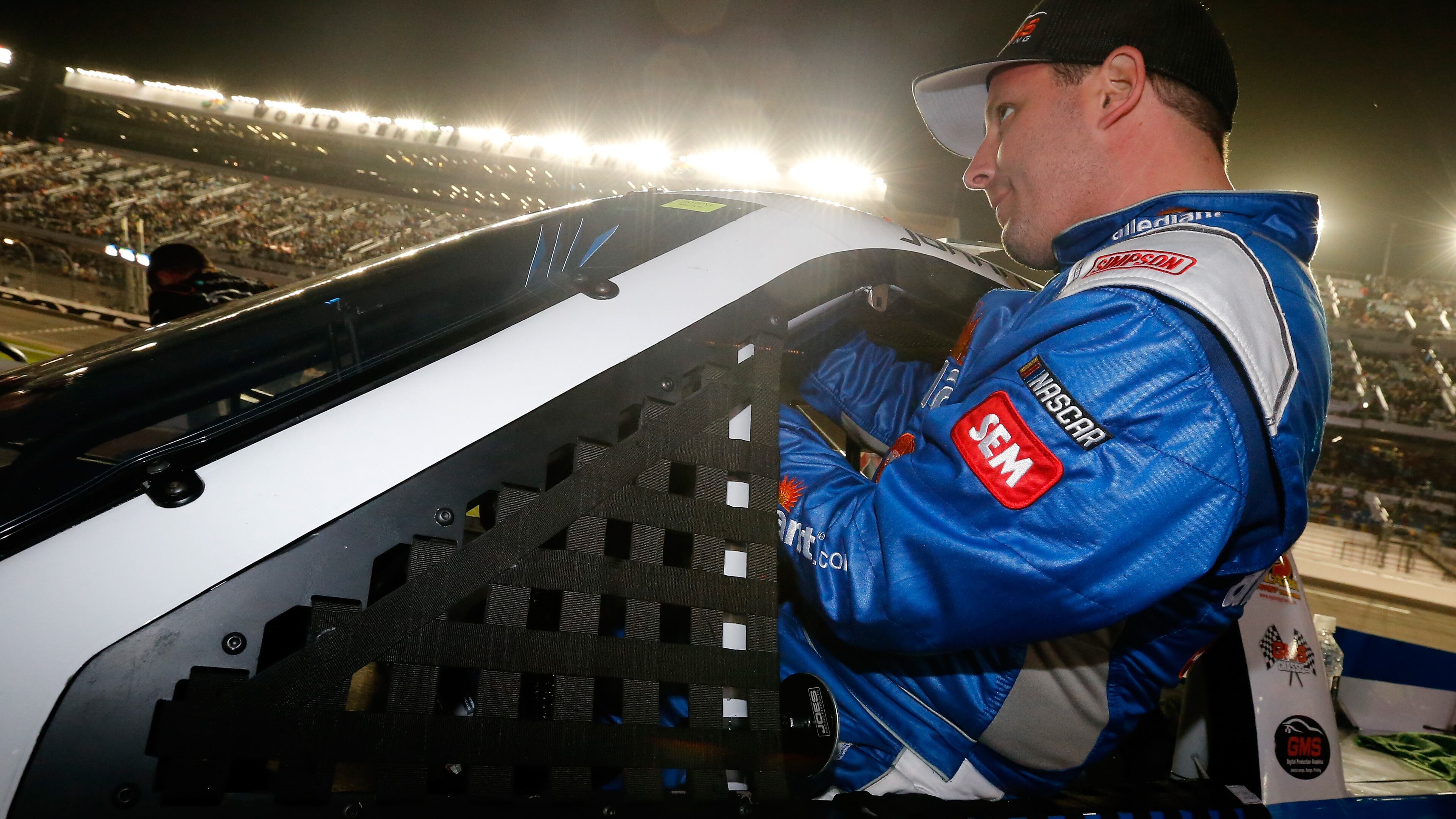 Johnny Sauter, driver of the No. 21 Allegiant Travel Chevrolet, gets in his truck during the NASCAR Camping World Truck Series NextEra Energy Resources 250 at Daytona International Speedway on February 24, 2017 in Daytona Beach, Florida. (Photo by Jonathan Ferrey/Getty Images)