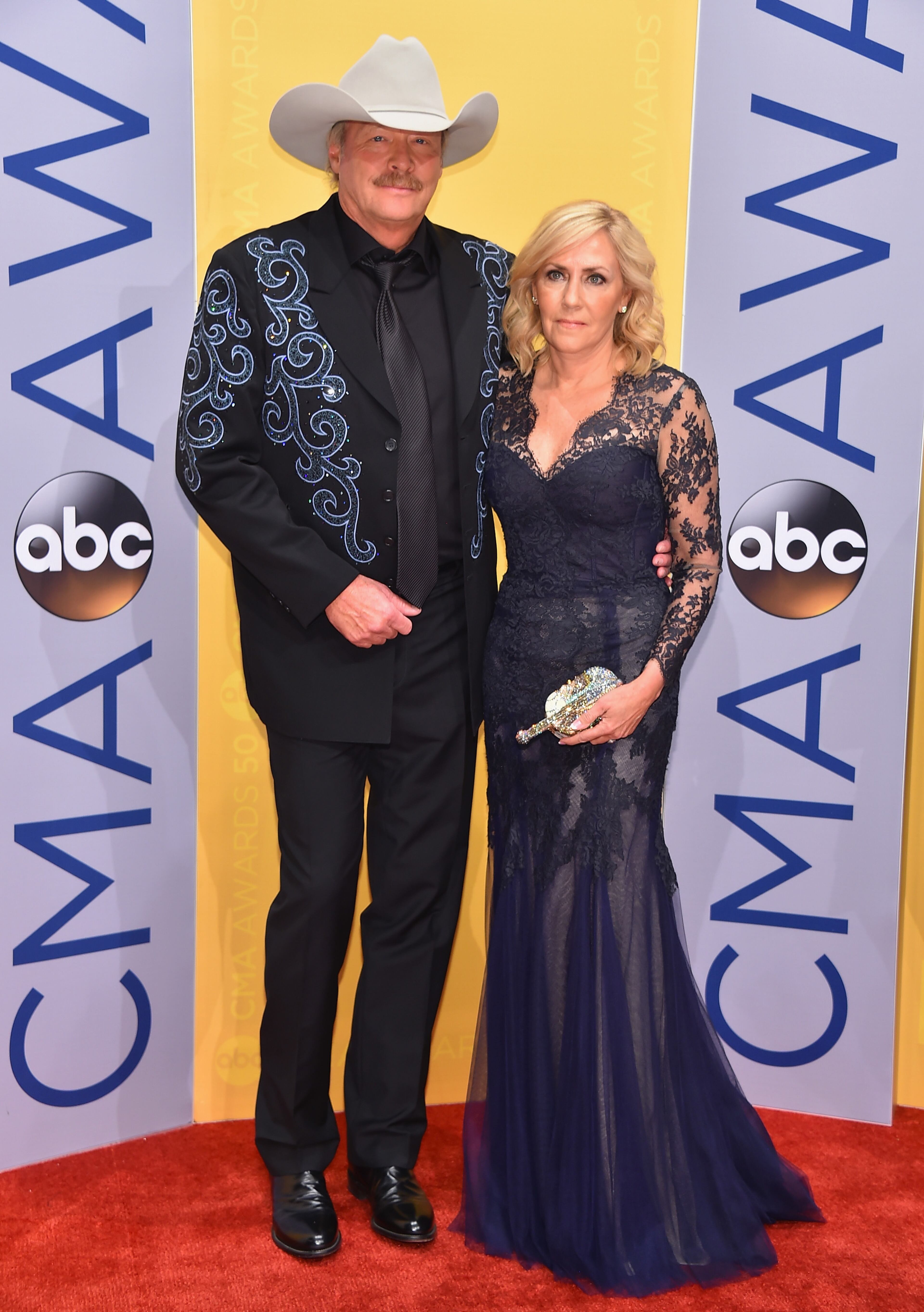 NASHVILLE, TN - NOVEMBER 02: Singer-songwriter Alan Jackson (L) and Denise Jackson attend the 50th annual CMA Awards at the Bridgestone Arena on November 2, 2016 in Nashville, Tennessee. (Photo by Michael Loccisano/Getty Images)