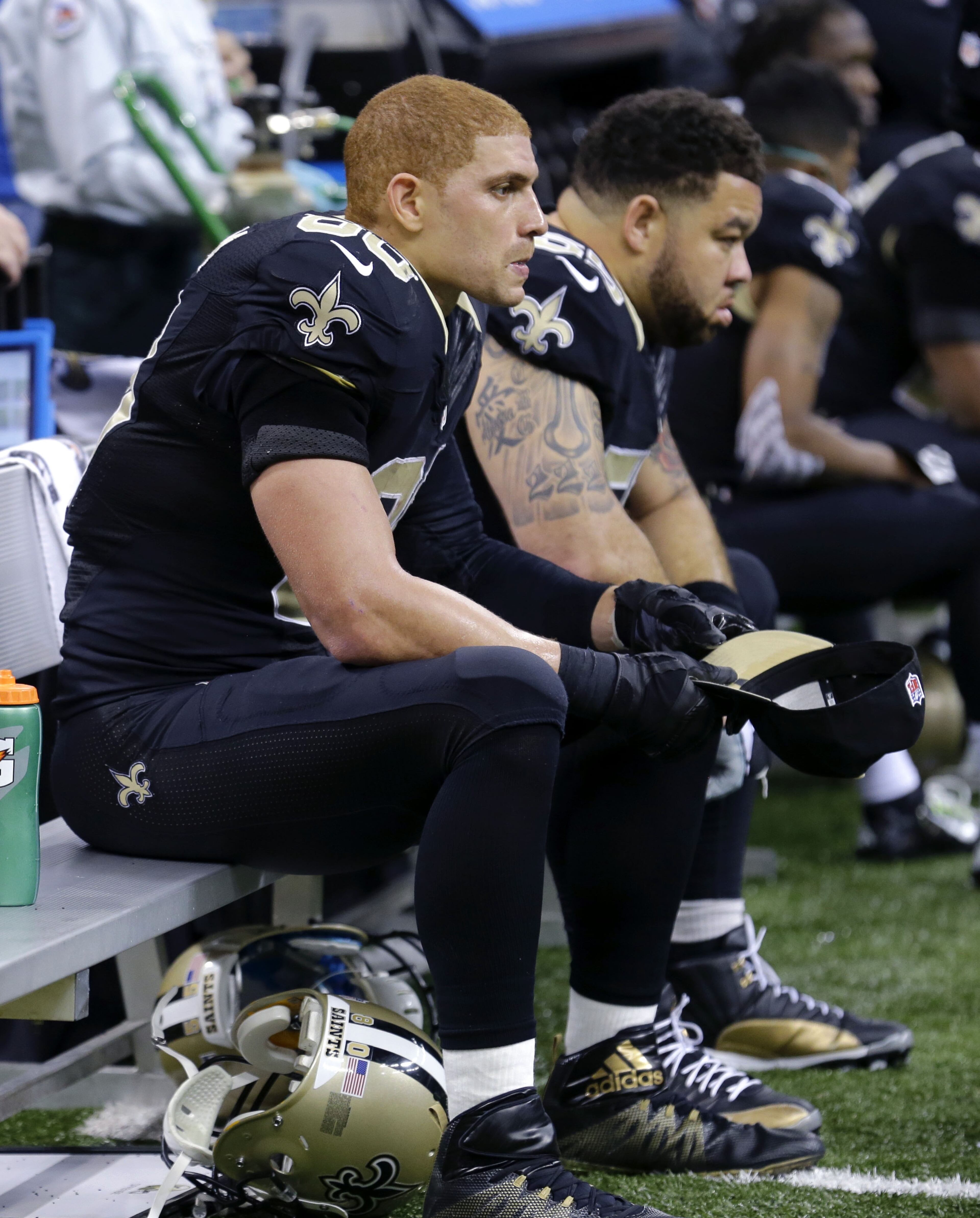 New Orleans Saints tight end Jimmy Graham (80) sits on the bench in the second half of an NFL football game against the Atlanta Falcons in New Orleans, Sunday, Dec. 21, 2014. (AP Photo/Bill Haber)