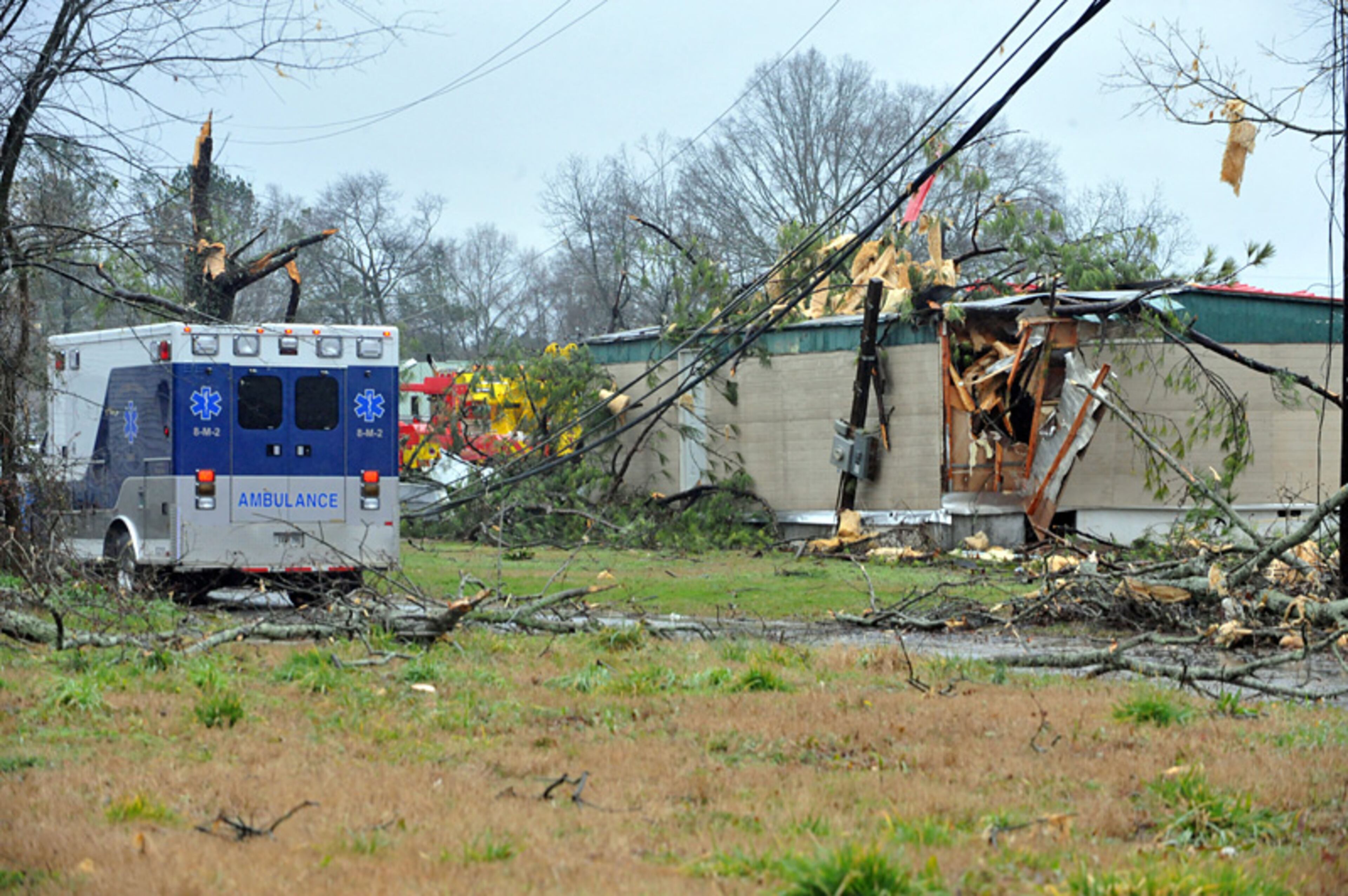 Residents in Adairsville clean up after a tornado smashed through town.