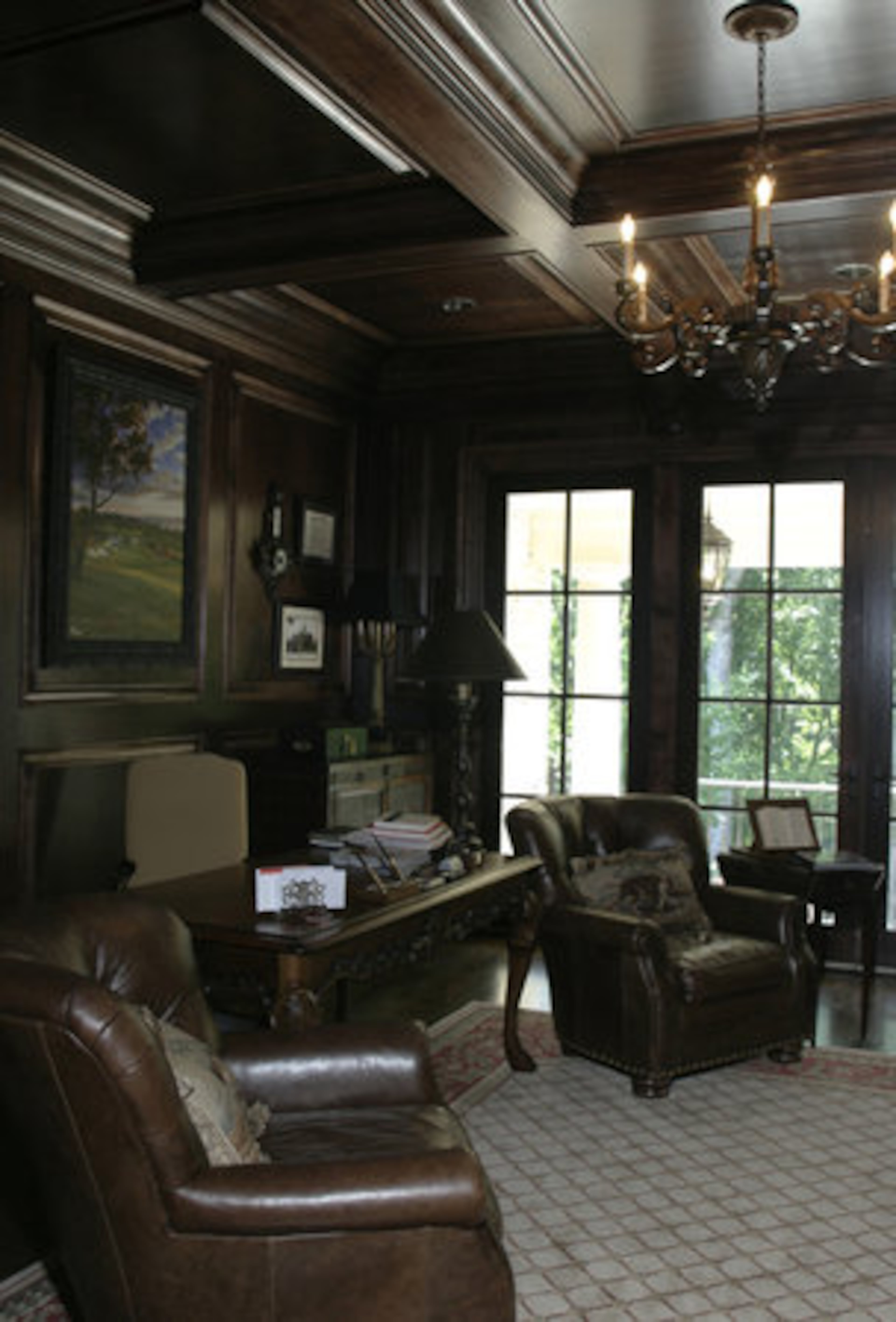Doug Davidson's paneled study overlooks the pool and has a balcony. "When Diana starts having pool parties I'll be sitting out here," he said with a chuckle.