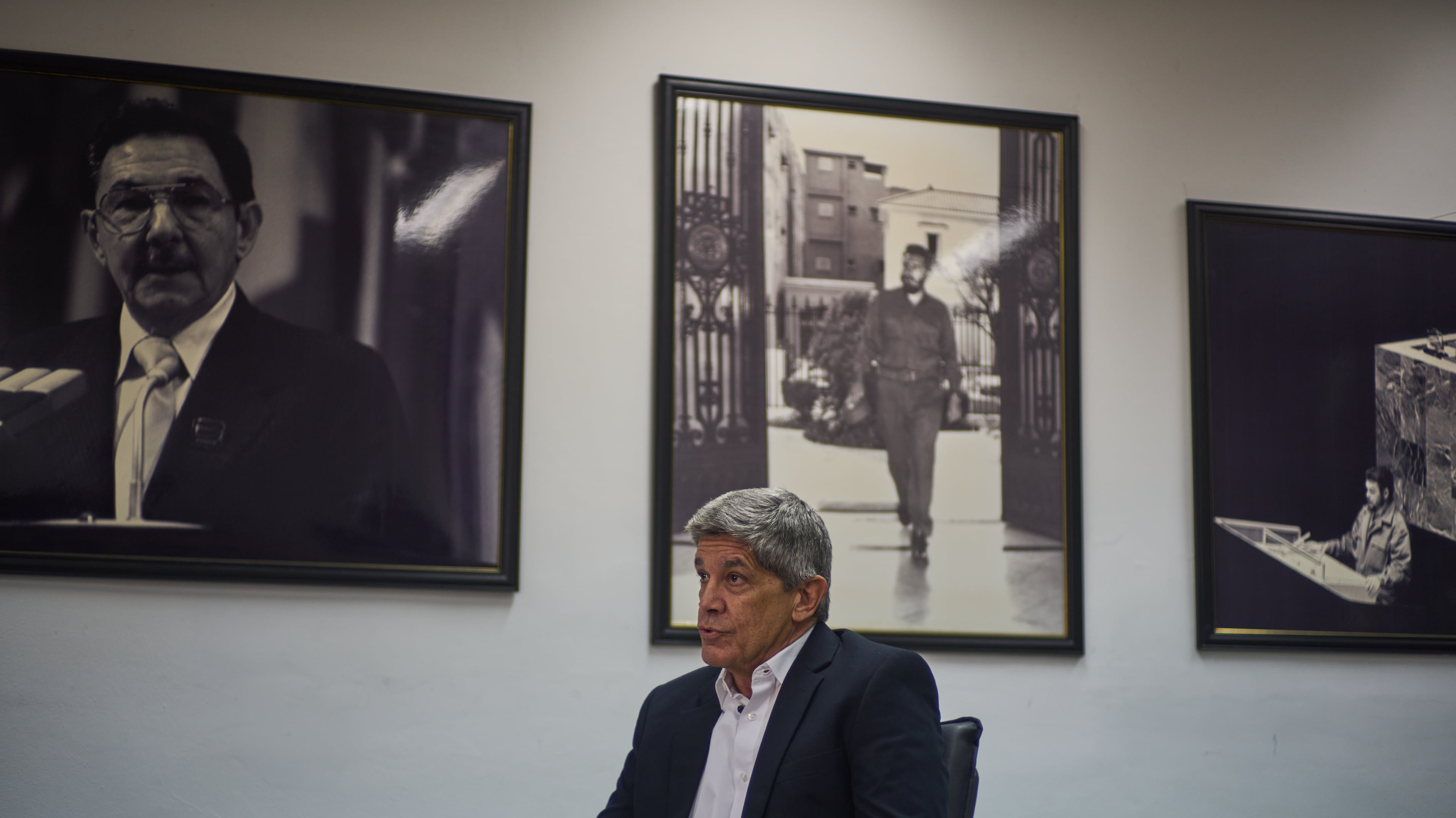 Cuban Deputy Foreign Minister Carlos Fernandez de Cossio gives an interview in front of images of Raul Castro, Fidel castro and Che Guevara, at the Foreign Ministry in Havana, Cuba, Monday, Feb. 2, 2026. (AP Photo/Ramon Espinosa)