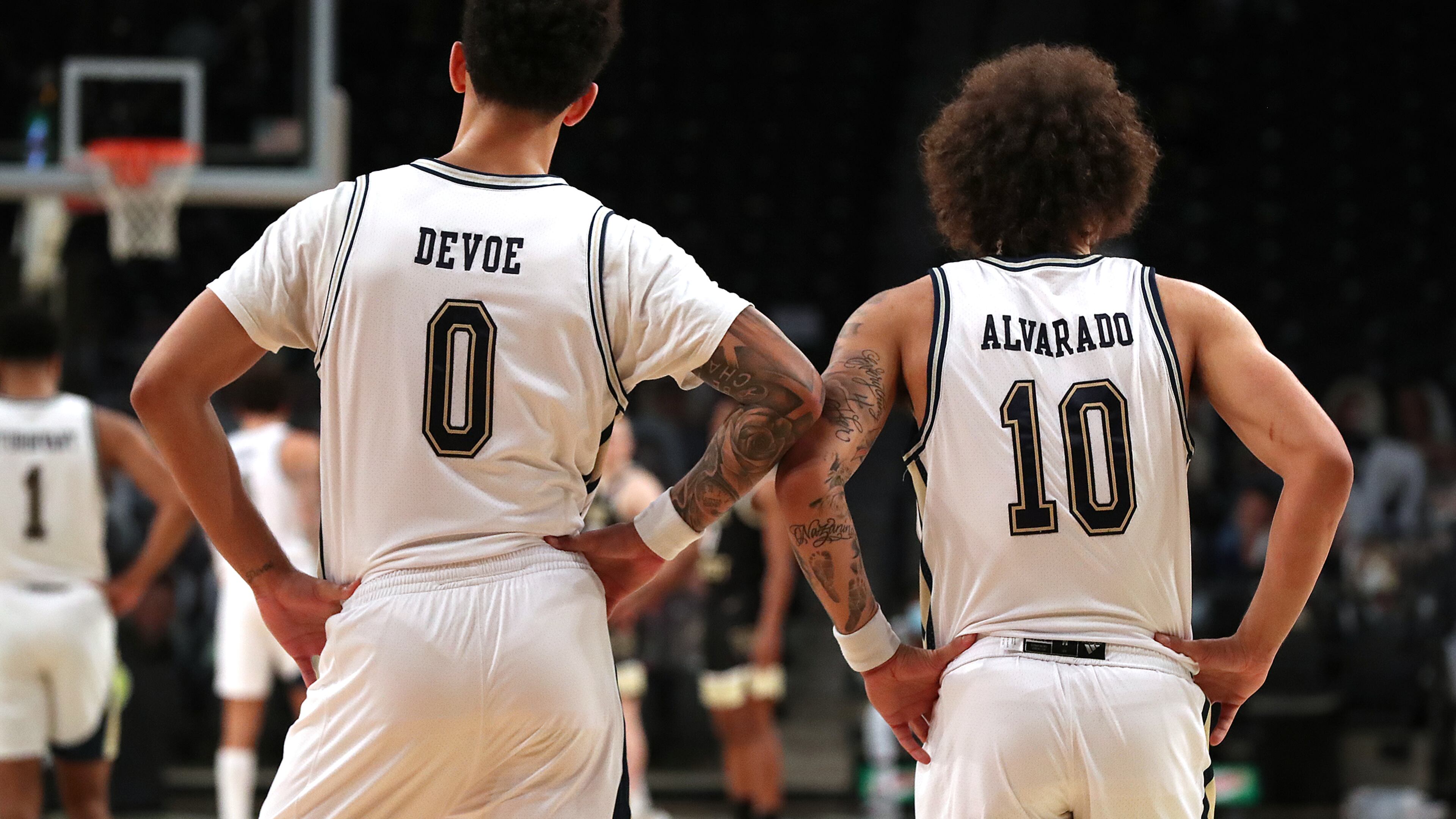 Georgia Tech team guards Jose Alvarado (10) and Michael Devoe (0) stand shoulder to shoulder on defense against Wake Forest Sunday, Jan. 3, 2021, at McCamish Pavilion in Atlanta. (Curtis Compton / Curtis.Compton@ajc.com)