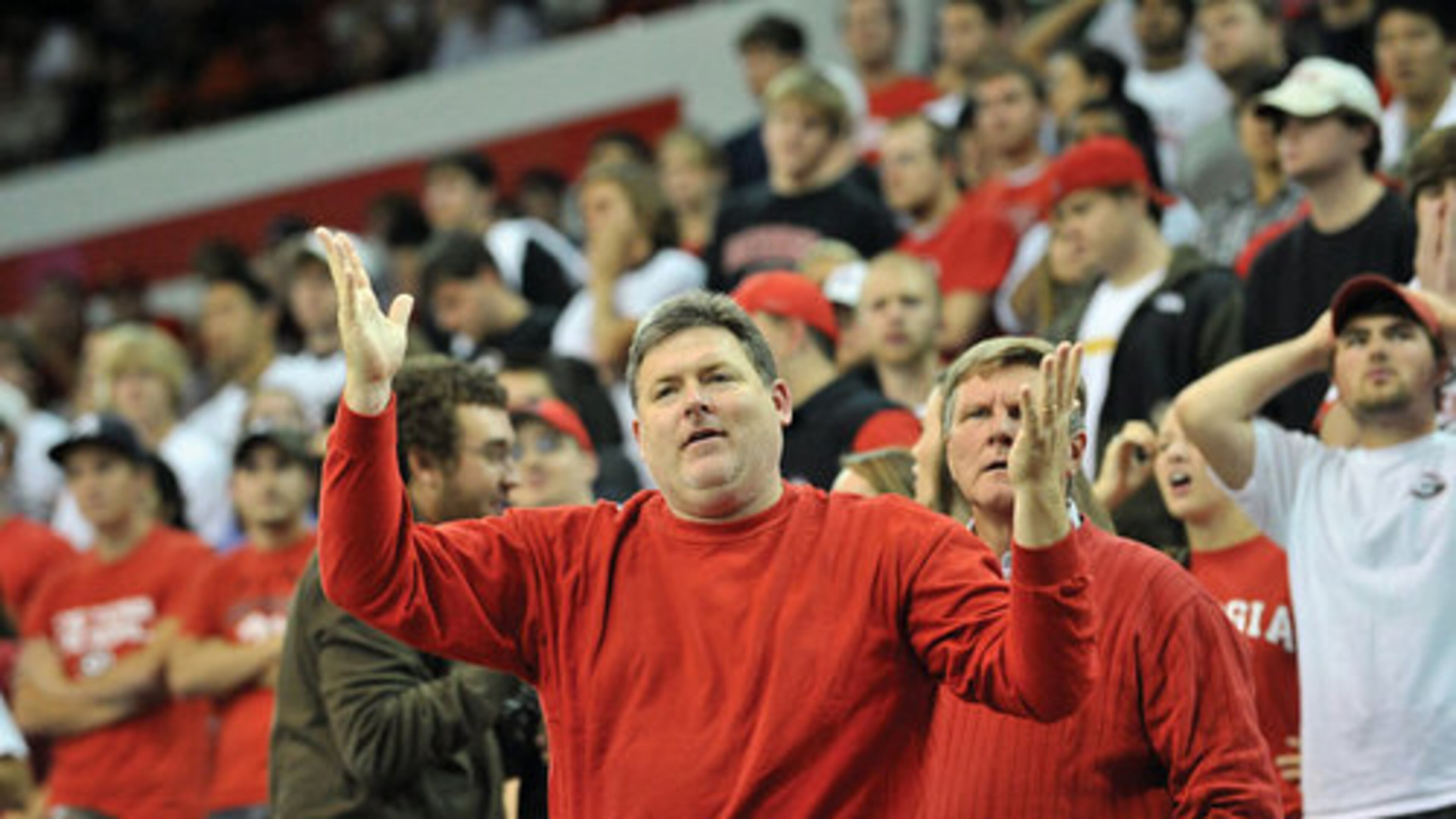 Georgia Bulldogs fans react during the second half against the Colorado Buffaloes at Stegeman Coliseum in Athens on Tuesday, Nov. 16, 2010. Bulldogs won 83 - 74 over the Colorado Buffaloes.
