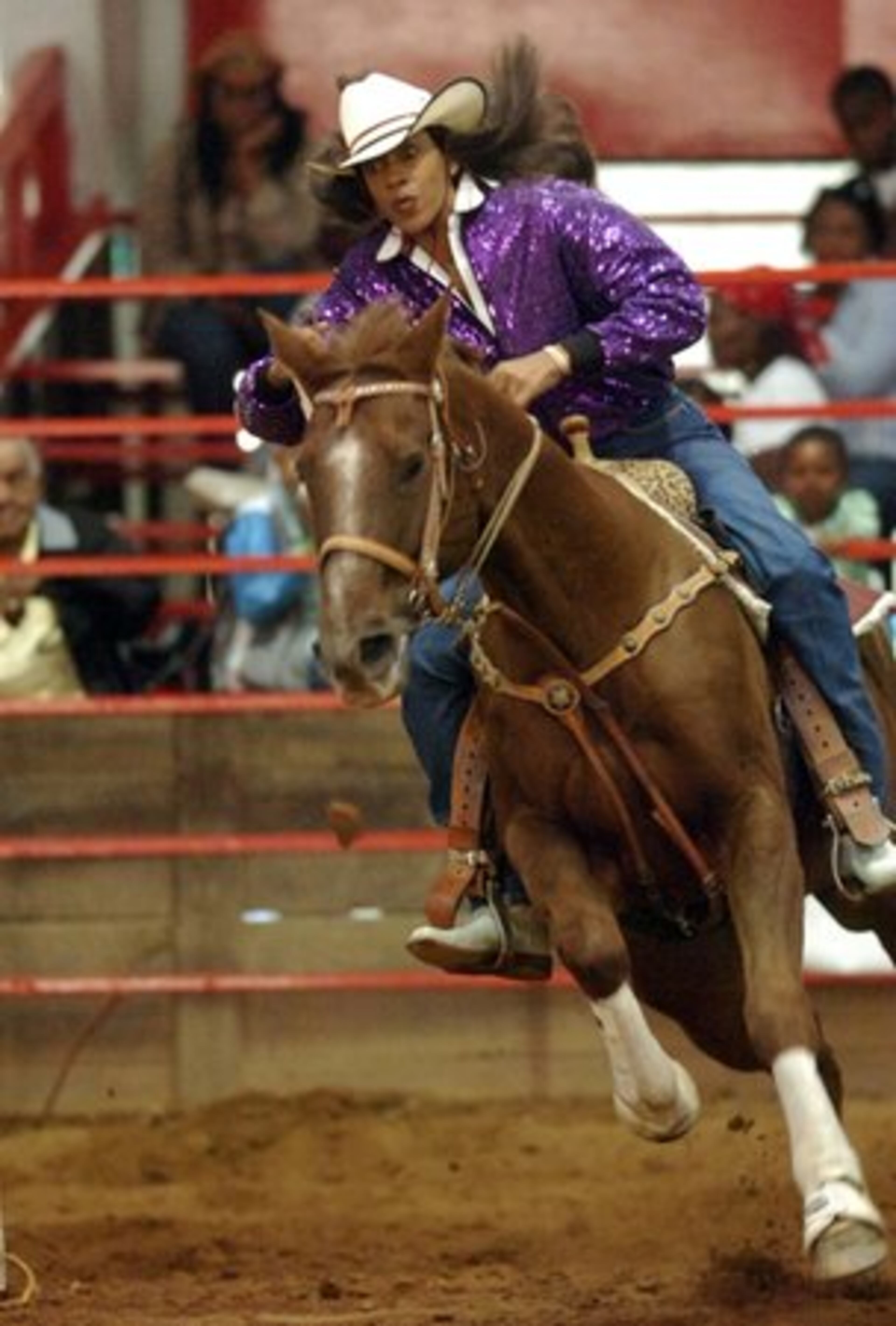 Ronnie Franks of Atlanta participates in the Barrel Racin' event during action Sunday afternoon.