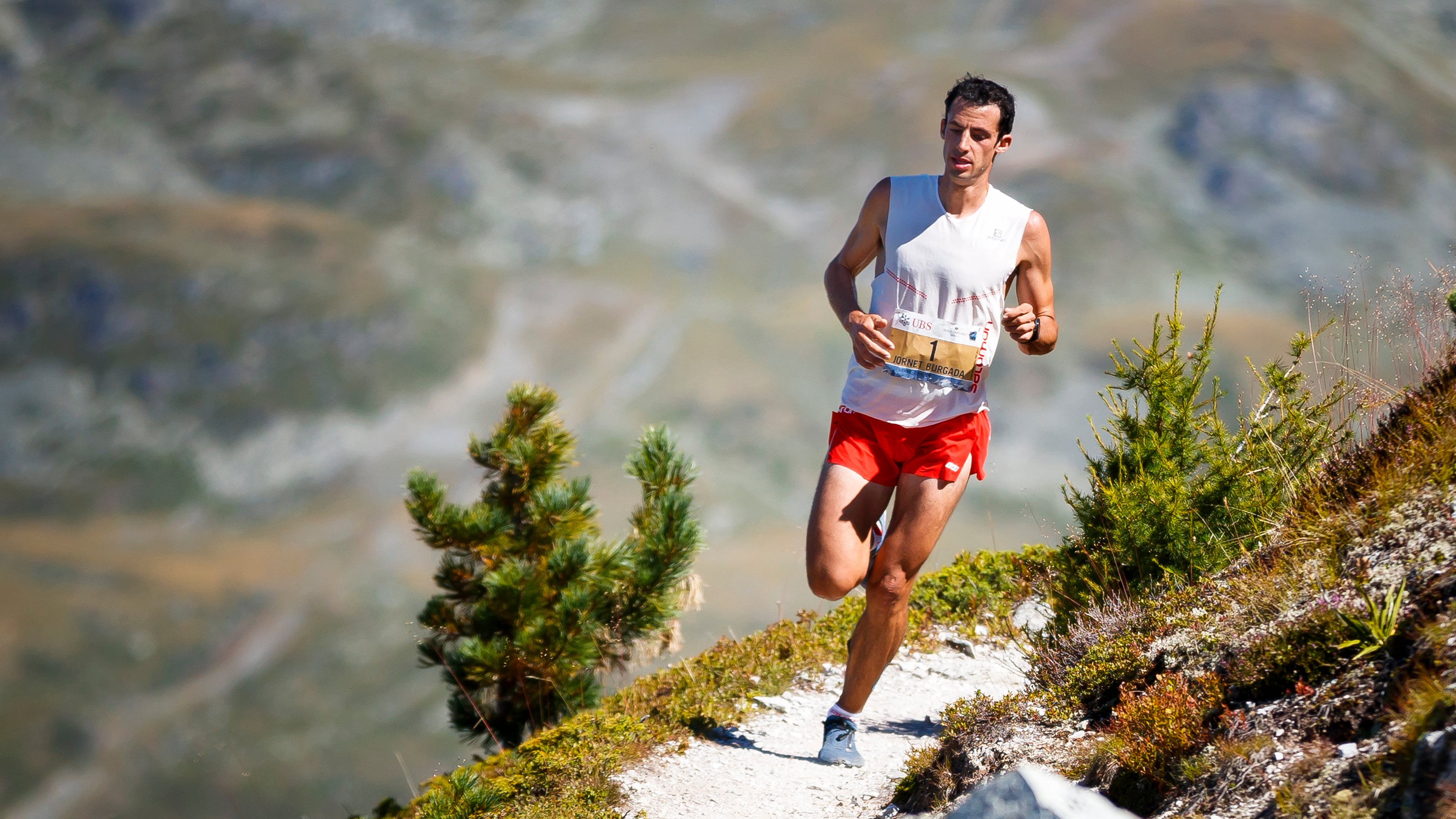 FILE - Kilian Jornet of Spain runs to win the 45th Sierre-Zinal long distance mountain race in Saint-Luc, Switzerland, Sunday, Aug. 12, 2018. (Valentin Flauraud/Keystone via AP,File)