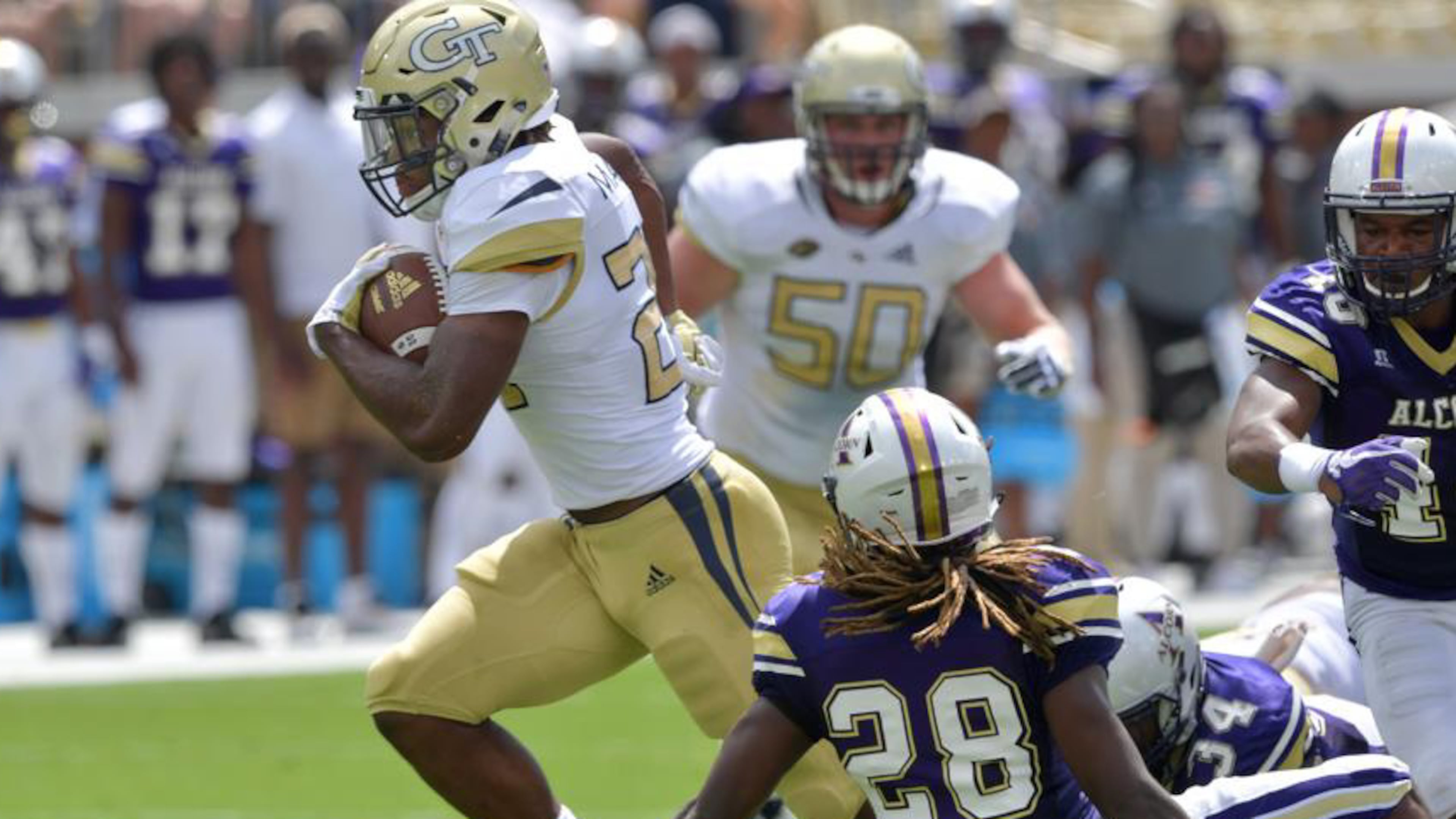 Georgia Tech running back Jordan Mason (24) breaks away for a go-ahead touchdown in the first half of the Georgia Tech home opener at Bobby Dodd Stadium on Saturday, September 1, 2018. HYOSUB SHIN / HSHIN@AJC.COM
