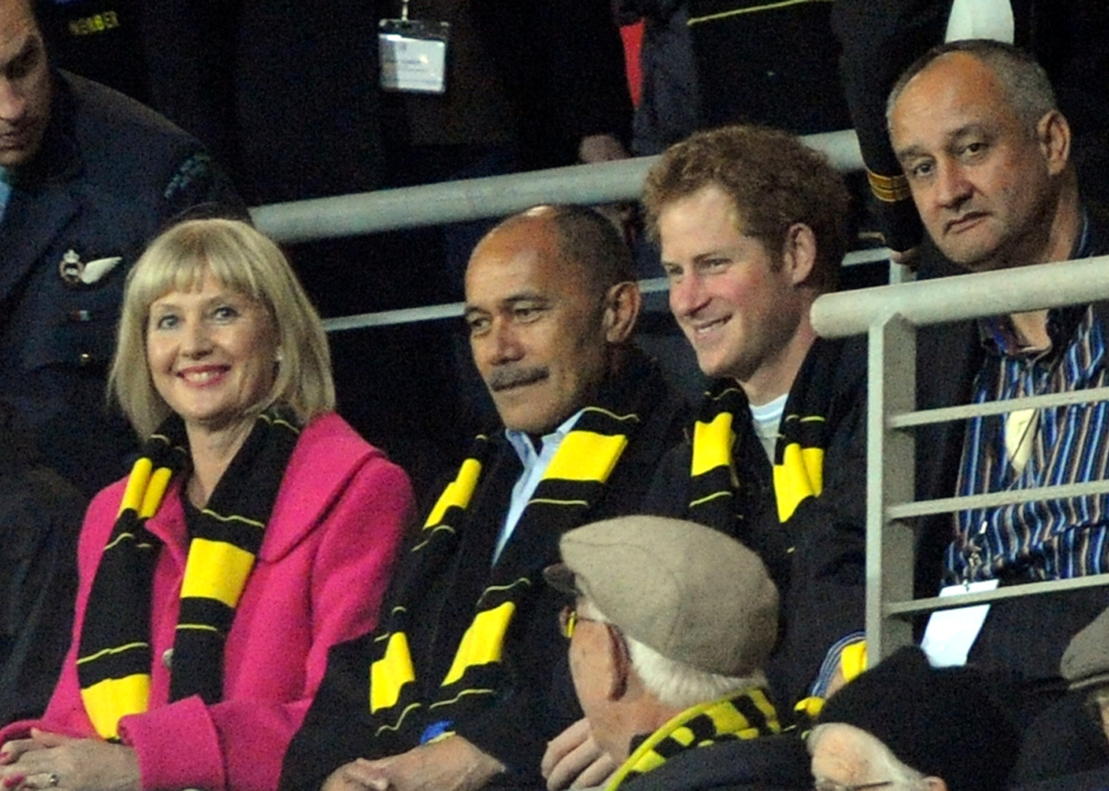 Britain's Prince Harry, second right, with the Governor General Sir Jerry Mateparae and his wife Janine, watches the Super Rugby match between the Hurricanes and Sharks at Westpac Stadium in Wellington, New Zealand, on May 9, 2015.