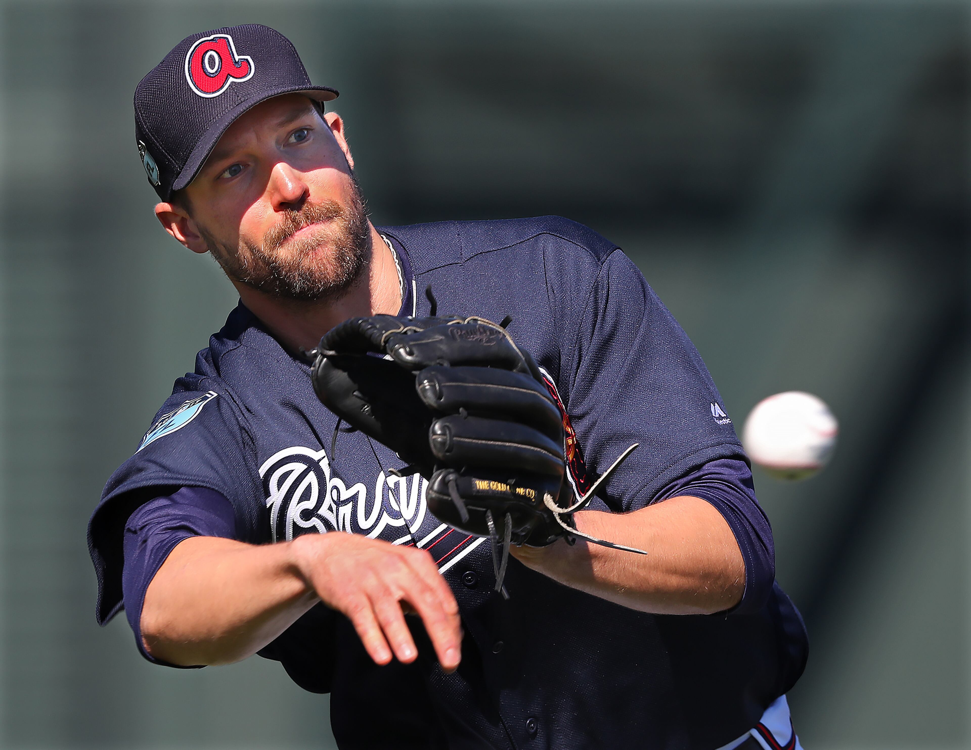 February 16, 2017, Lake Buena Vista, FL: Braves pitcher Jim Johnson throws to first after fielding a ground ball on Thursday Feb. 16, 2017, at the ESPN Wide World of Sports in Lake Buena Vista. Curtis Compton/ccompton@ajc.com