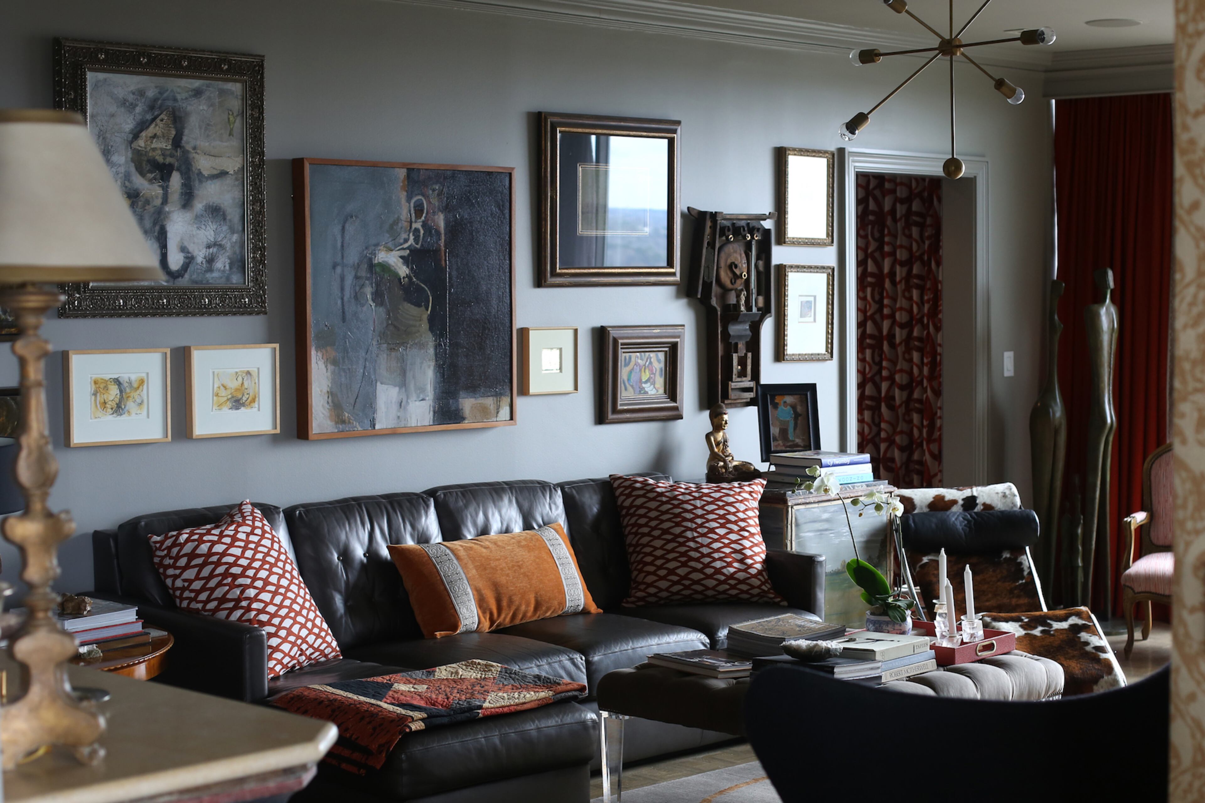 The interiors are described by Steve and Jill McKenzie as curated, with art, sculpture, custom items such as a chandelier designed by Steve McKenzie and made by Grey Furniture, and pillows with fabric by Steve.