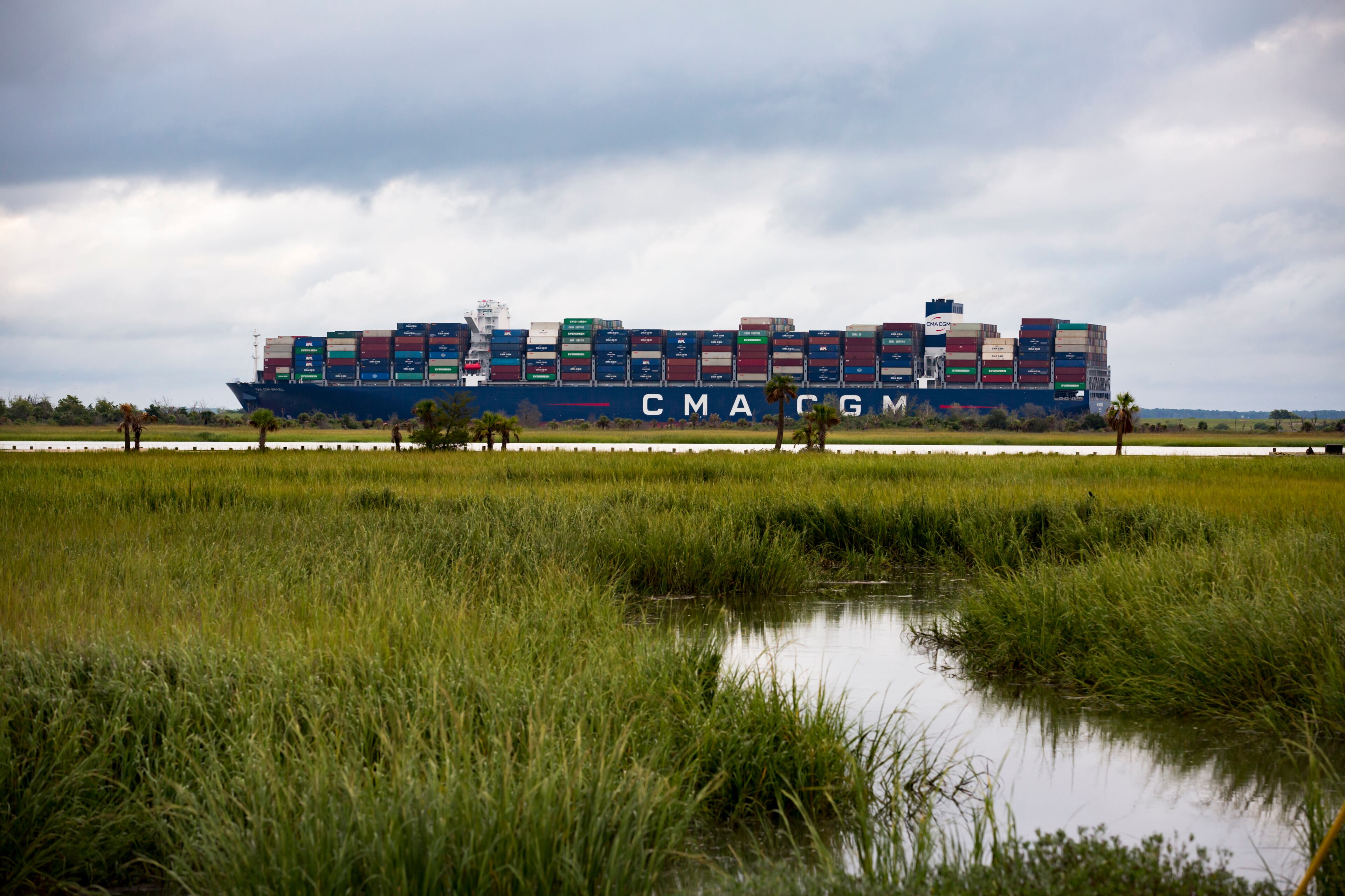 TYBEE ISLAND, GA - SEPTEMBER 18, 2020: The CMA CGM Brazil sails past the marshes along the Savannah River as it makes its way up river to the Georgia Ports Authority's Garden City Terminal, Friday, Sept., 18, 2020, in Tybee Island, Ga. (AJC Photo/Stephen B. Morton)