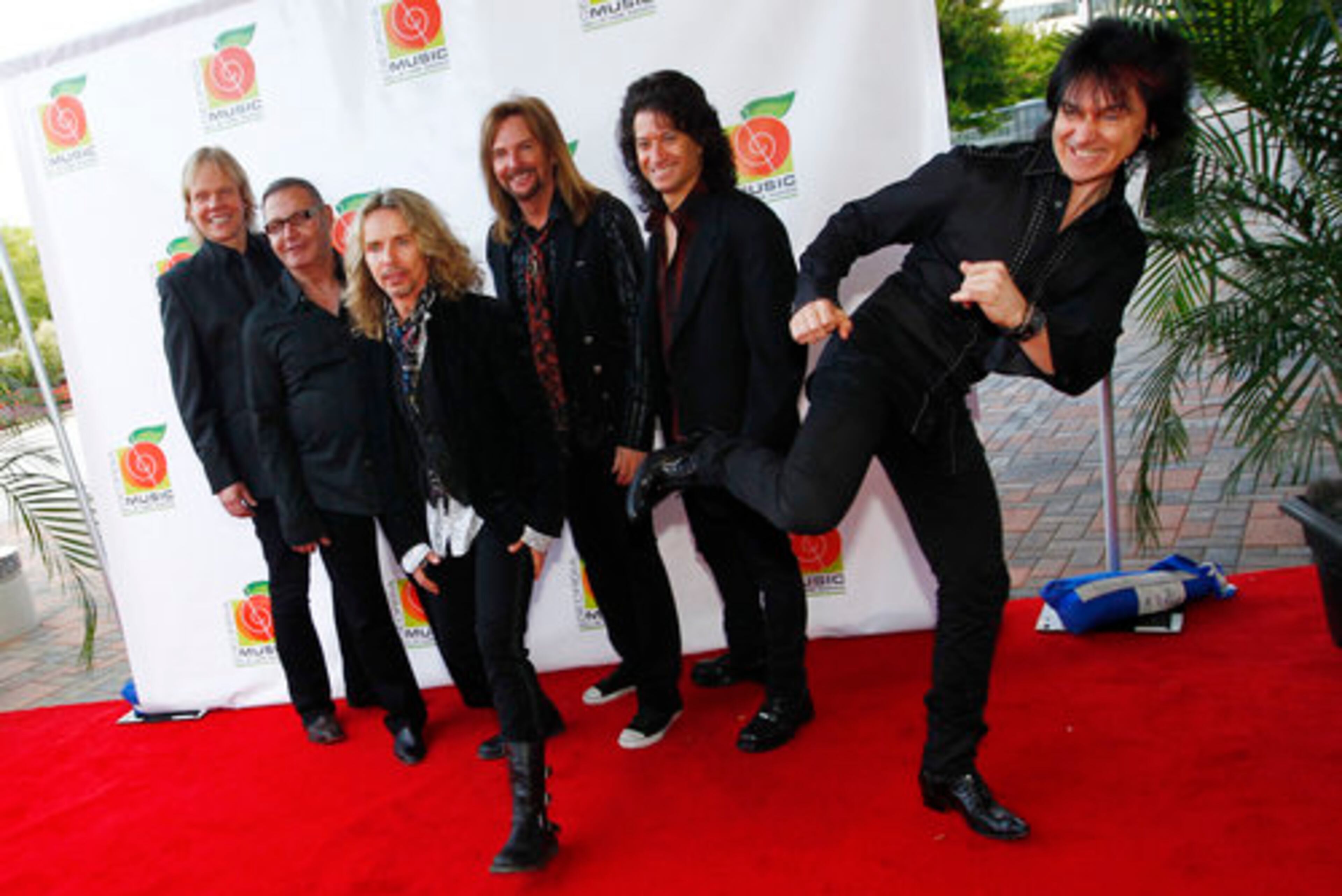 The band Styx goofs around on the red carpet before the Georgia Music Hall of Fame Awards.